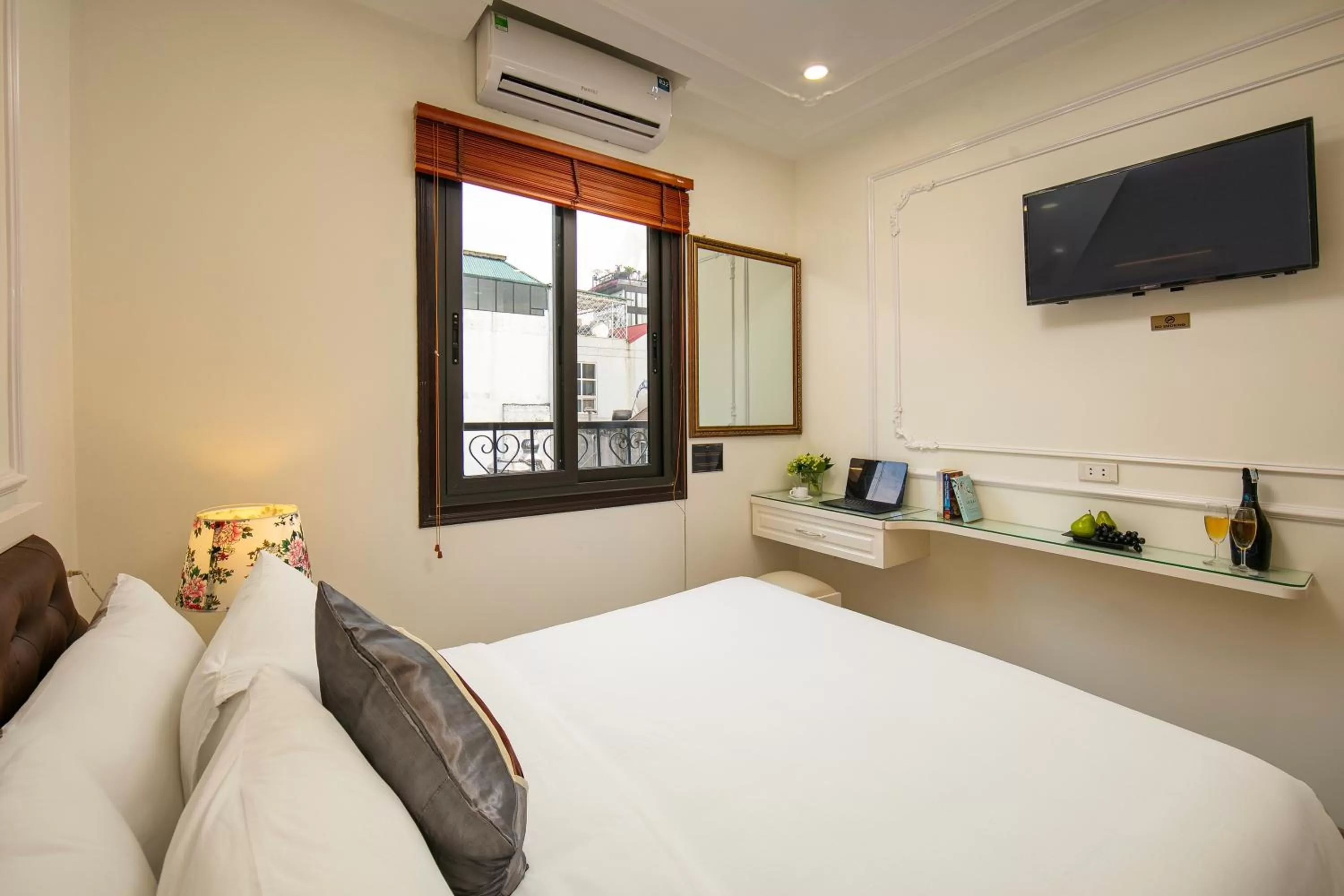 Bed in Tunger Grand Hotel