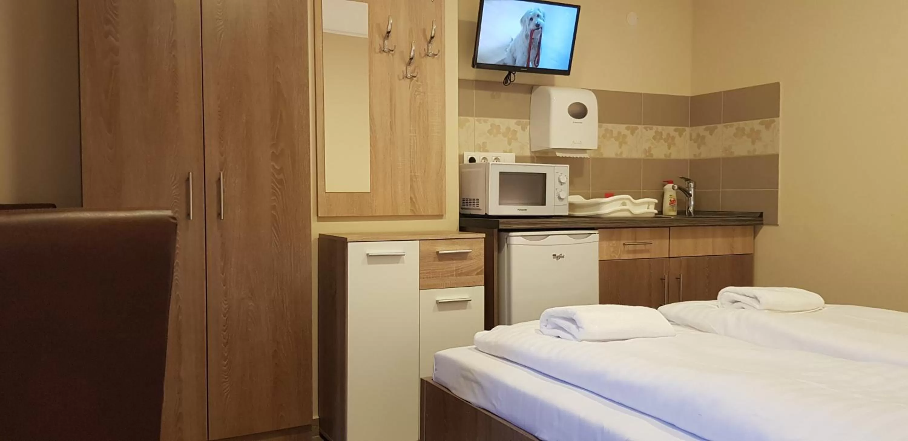 Bed in Central Panzió Gyula