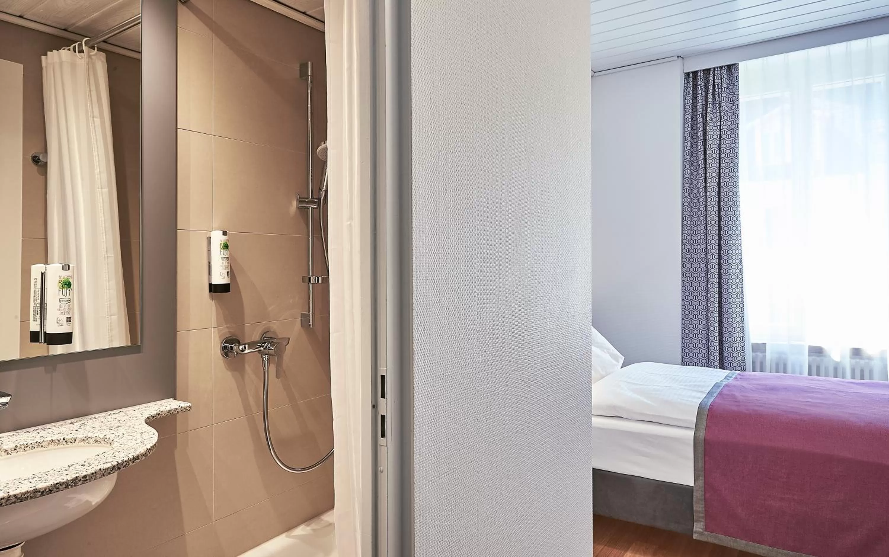 Shower, Bed in Hotel Central Luzern