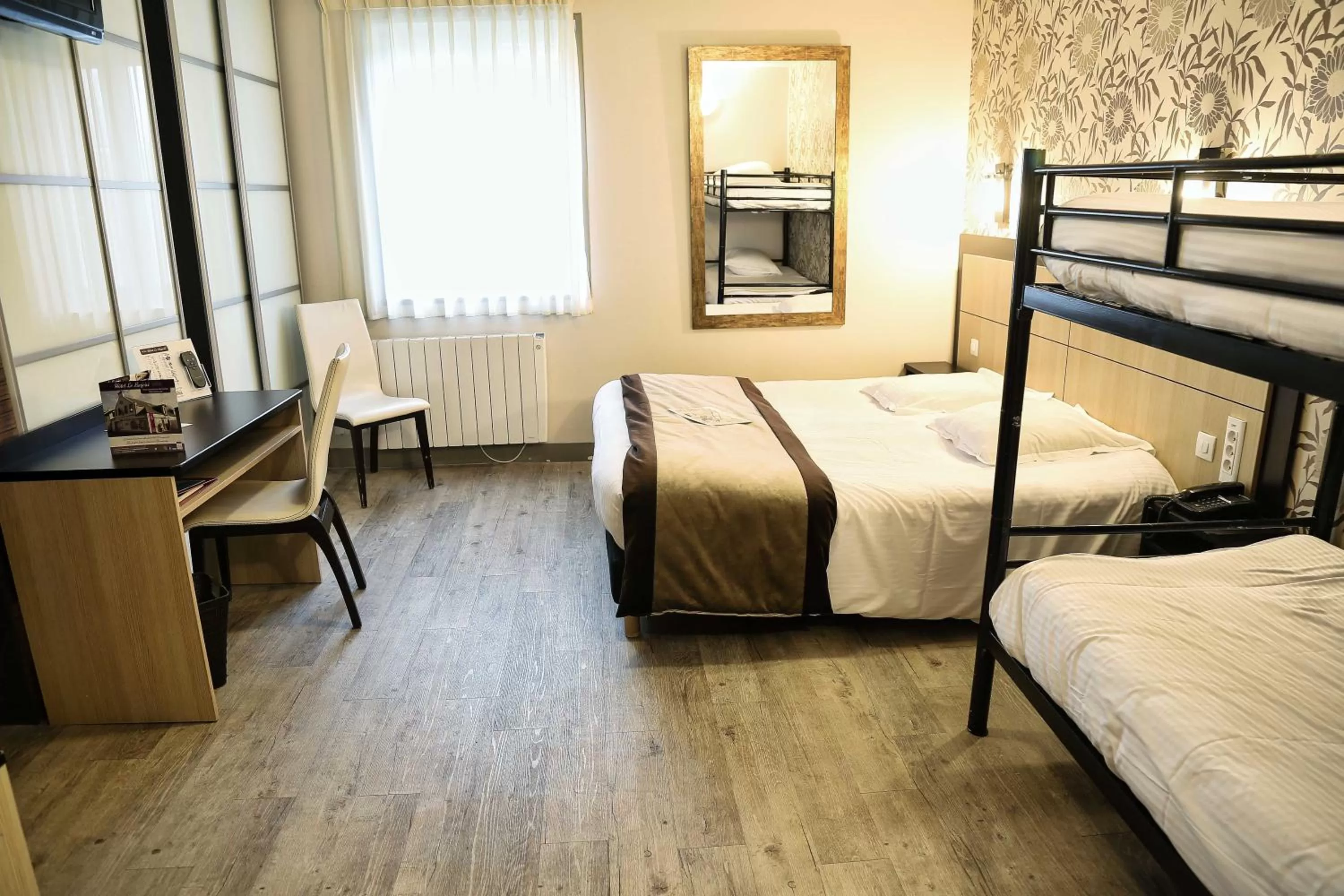 Photo of the whole room, Bed in Hôtel Le Bayeux