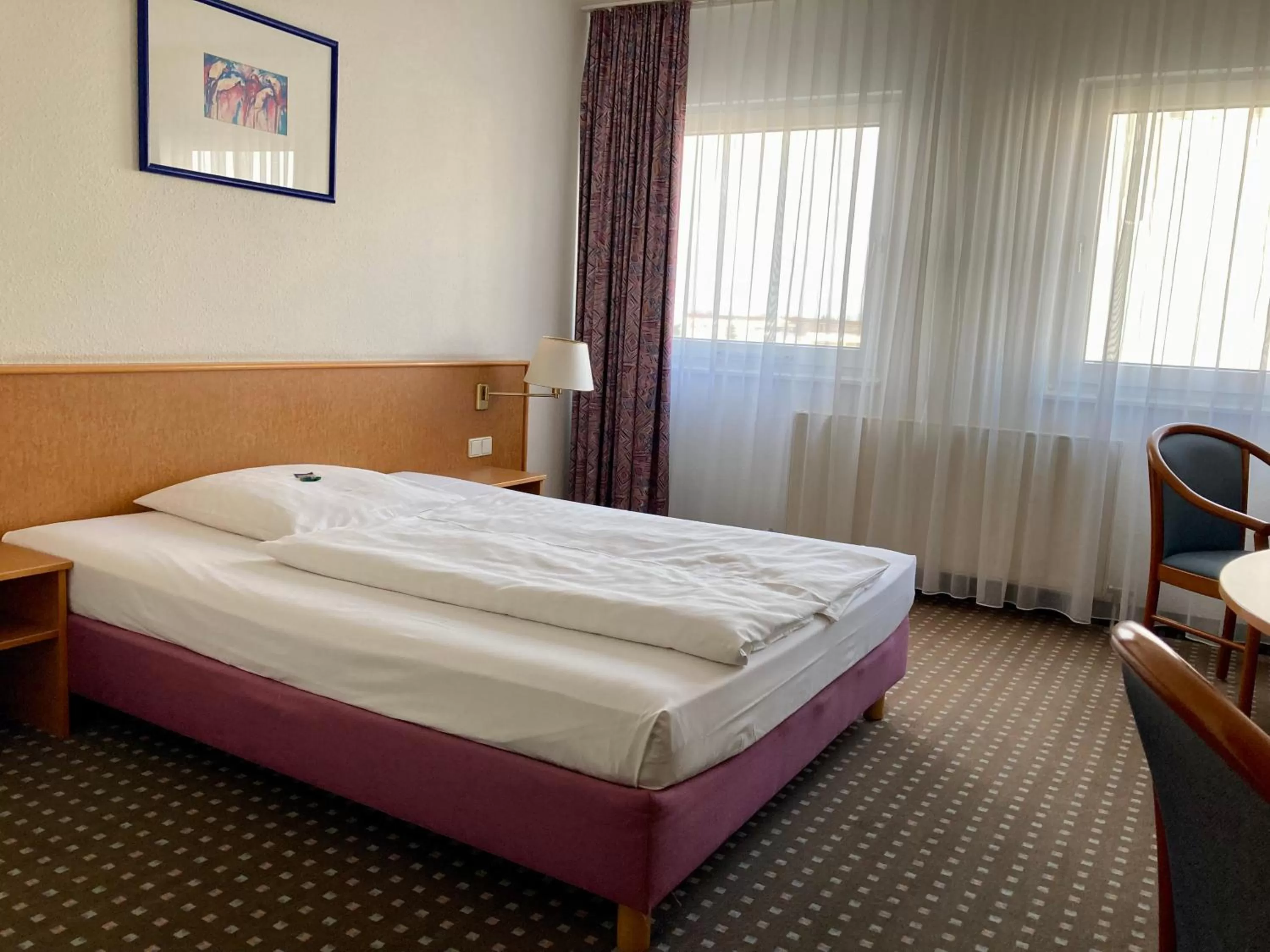 Bed in Akzent Congresshotel Hoyerswerda