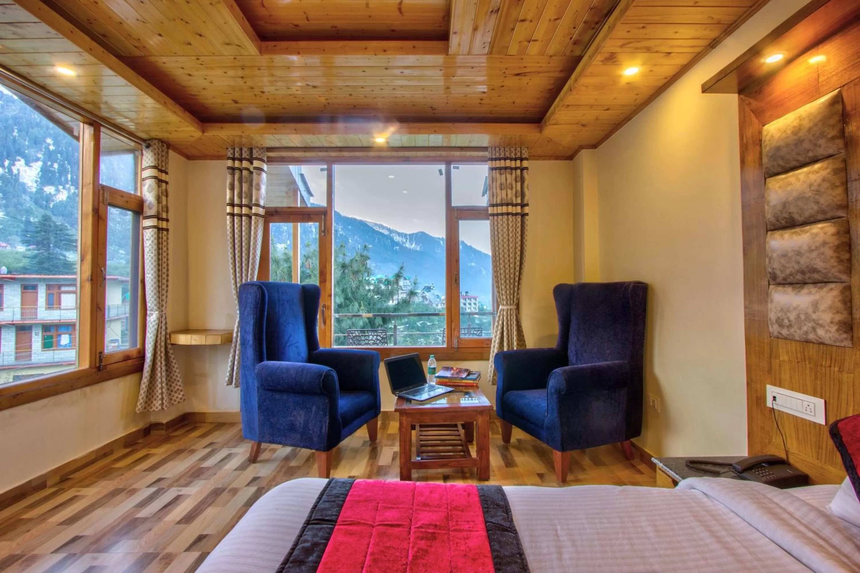 Seating area in Snow City's Montana Blues Resort Manali - Heated & Air-Cooled Stay