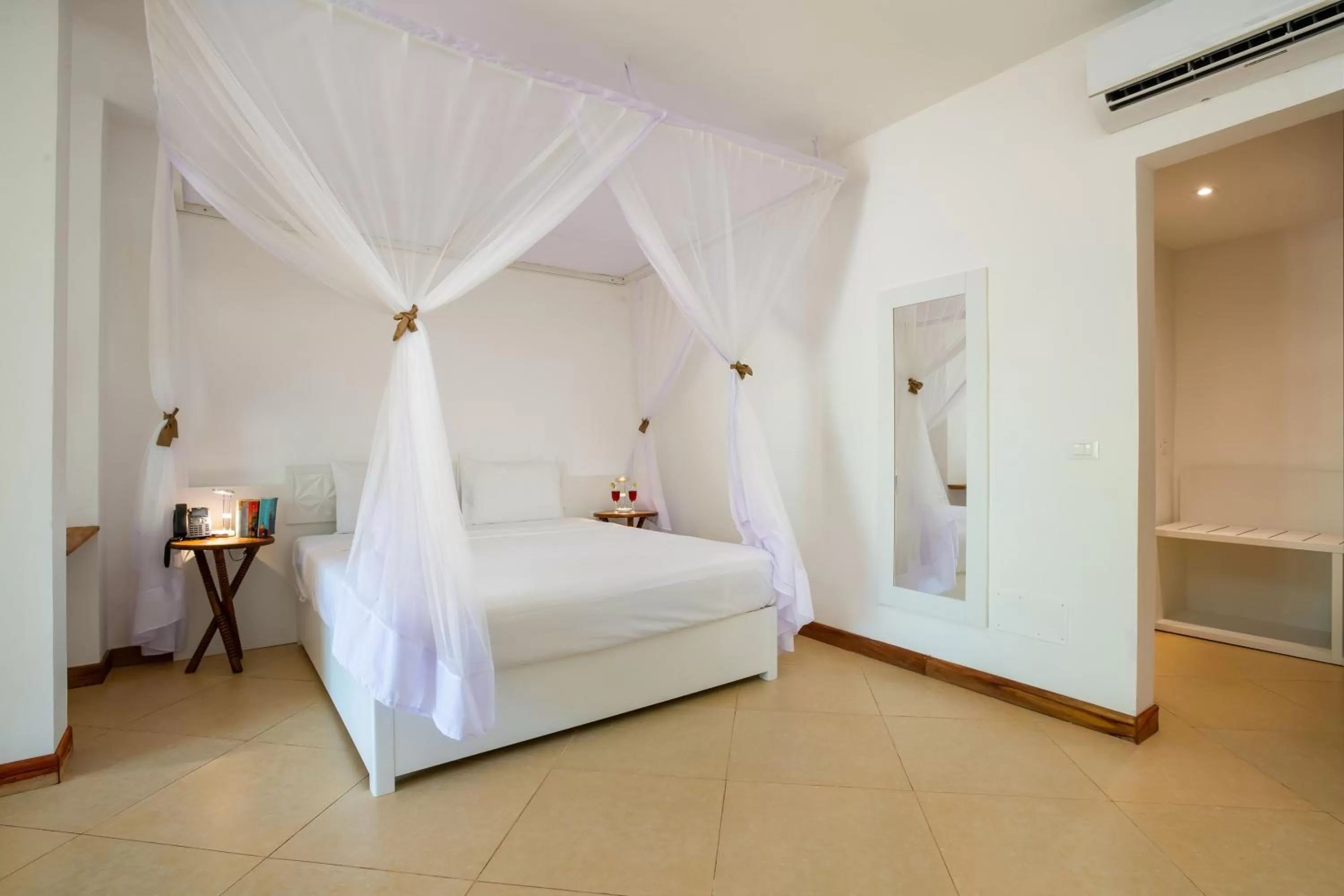 Photo of the whole room, Bed in Sandies Baobab Beach Zanzibar