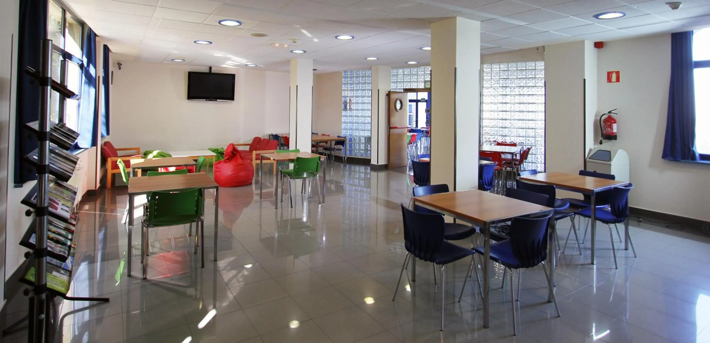 Communal lounge/ TV room in Bilbao Hostel