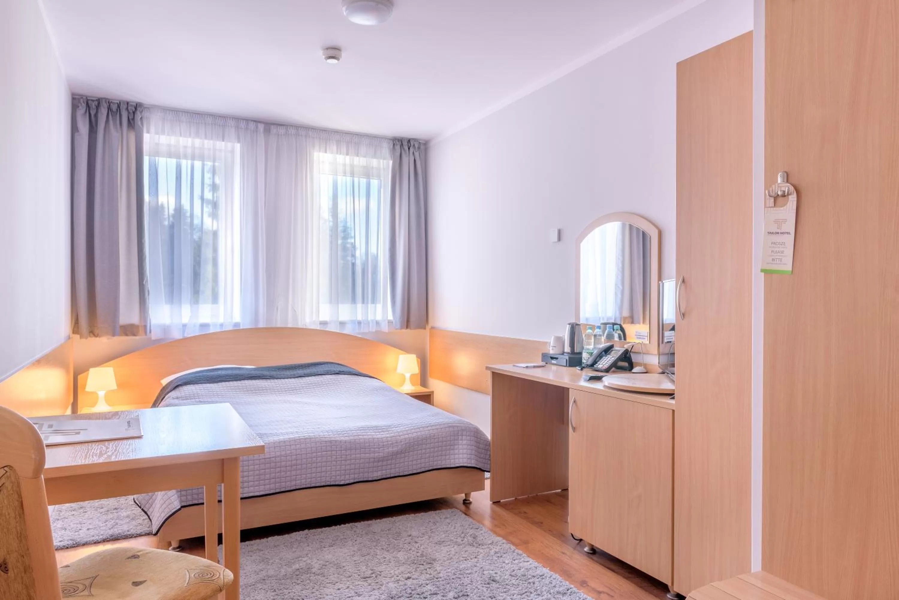 Bed in Tailor Hotel Sport & Conference