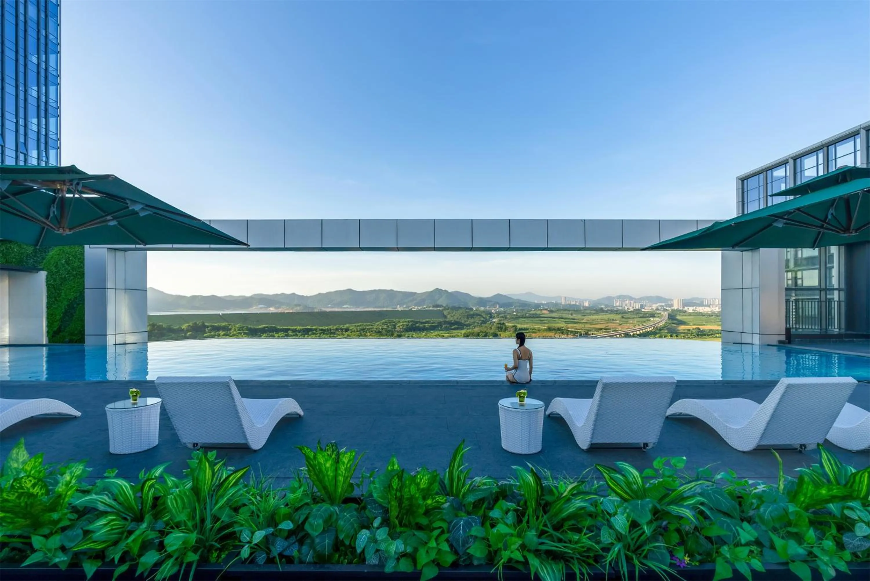 Swimming pool in EVEN Hotels Shenzhen Guangming Cloud Park by IHG