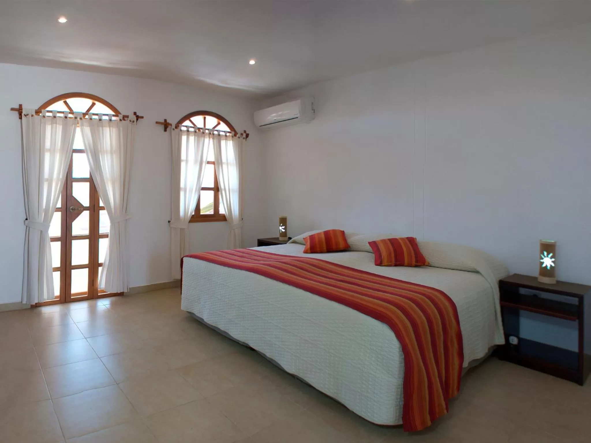 Bed in Hotel Galapagos Suites B&B