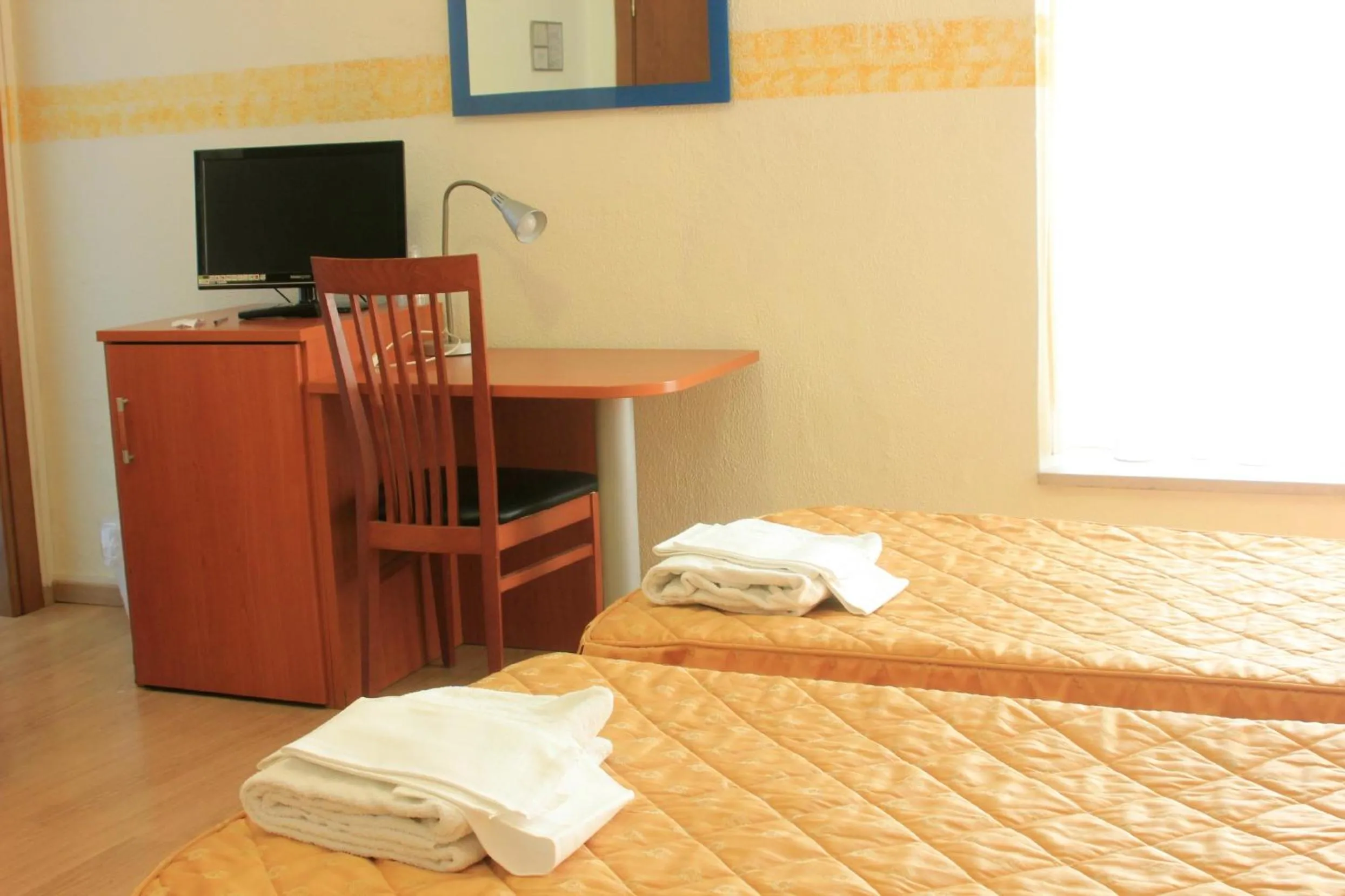 TV and multimedia, Bed in Hotel Bellevue