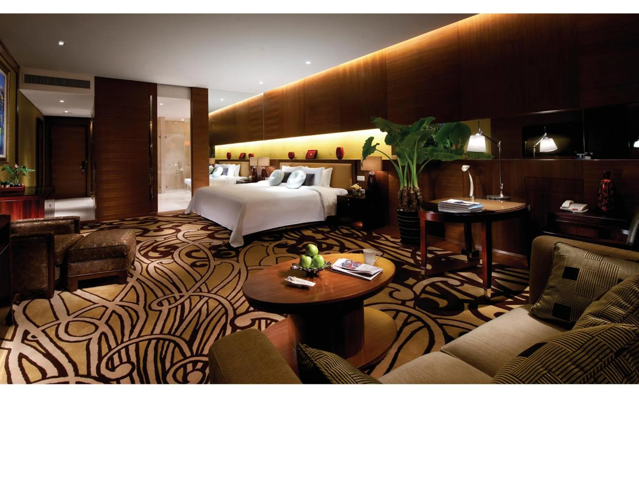 Seating area, Bed in HJ International Hotel