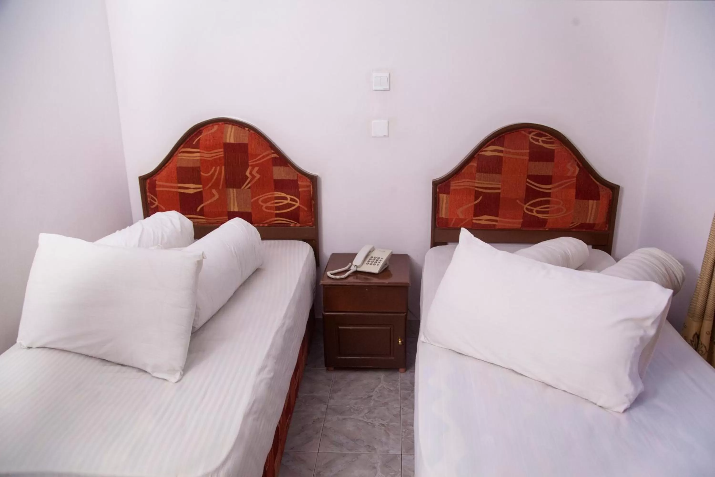 Bed in Natron Palace Hotel