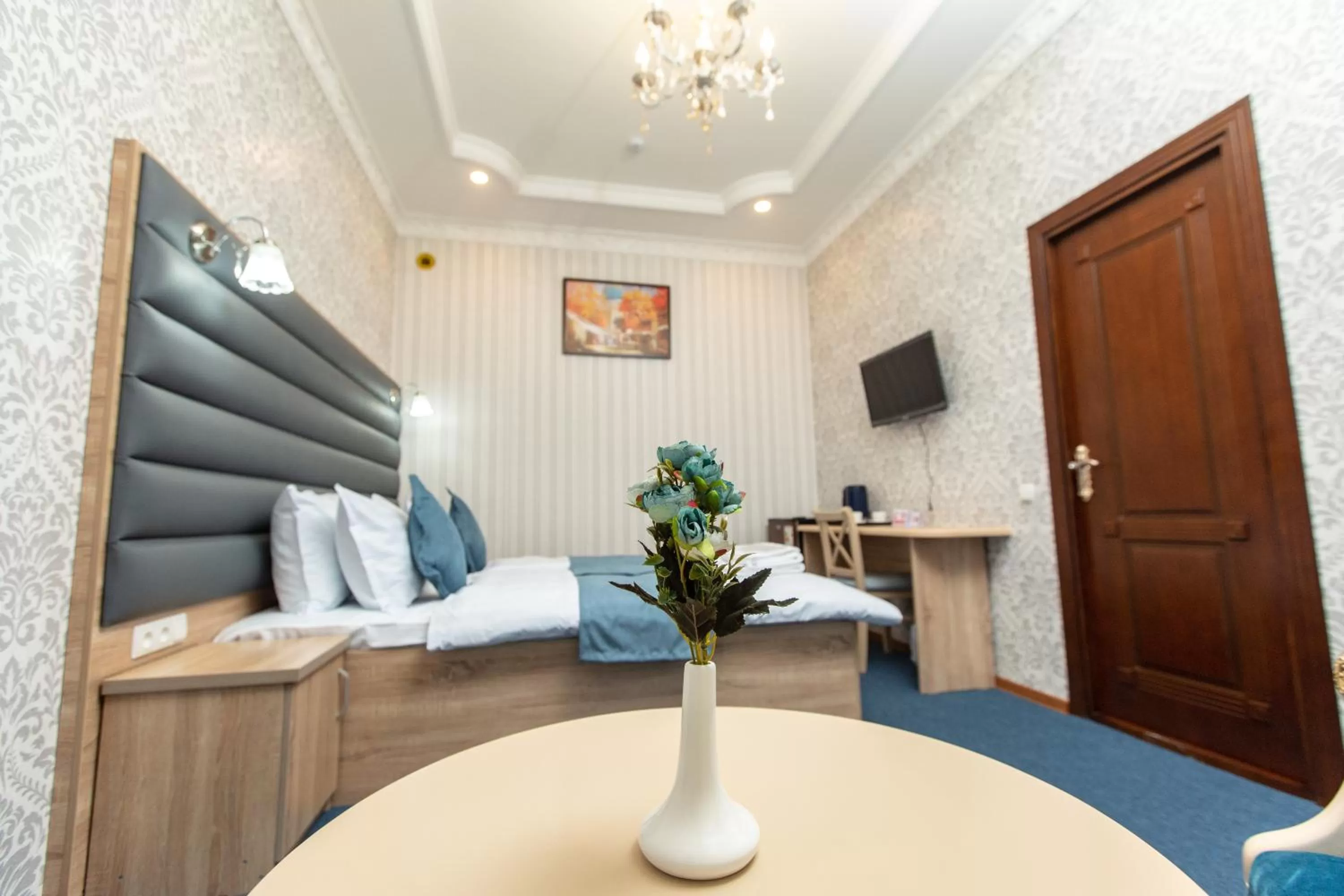 Photo of the whole room, Bed in Mirzo Boutique Hotel