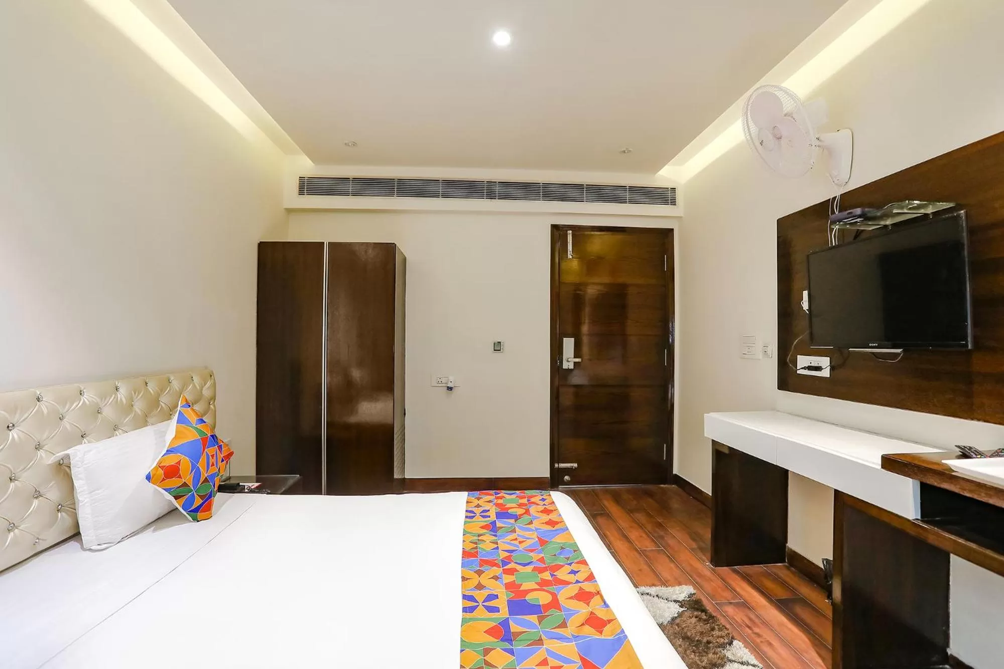 Communal lounge/ TV room, Bed in FabHotel Grand Stay