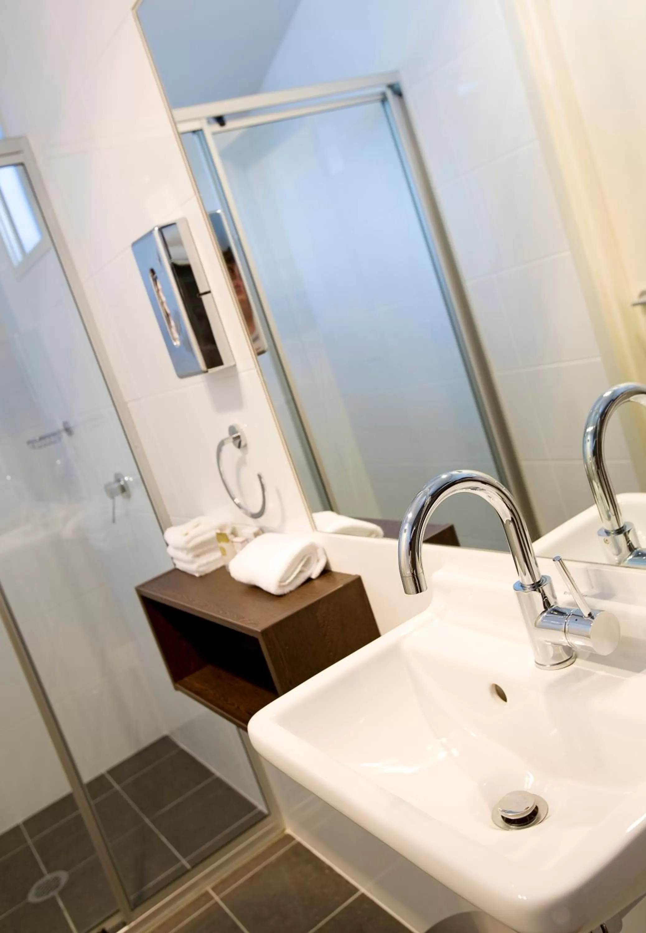 Bathroom in ibis Styles Canberra Tall Trees