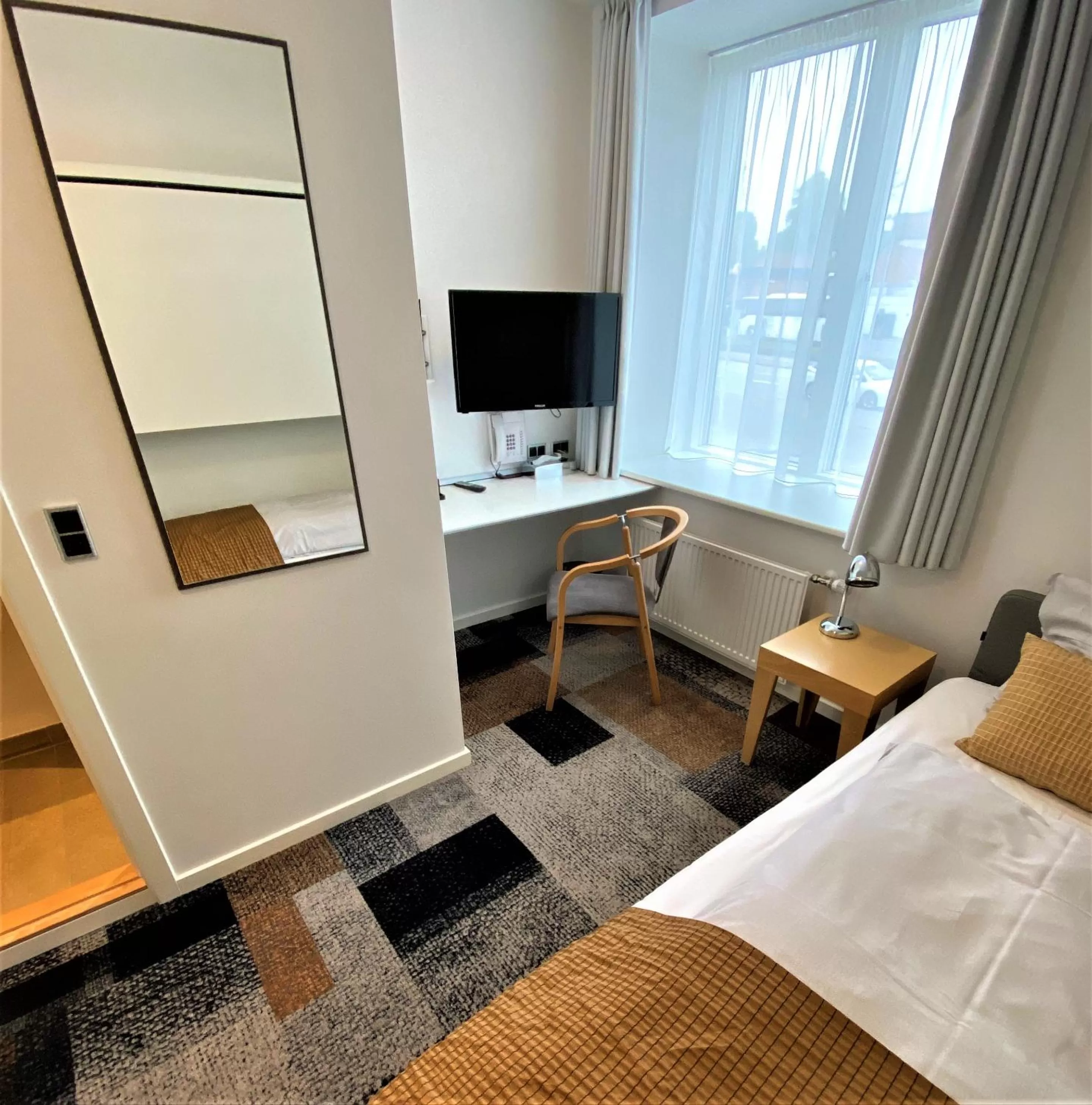 Bed in Hotel Skivehus