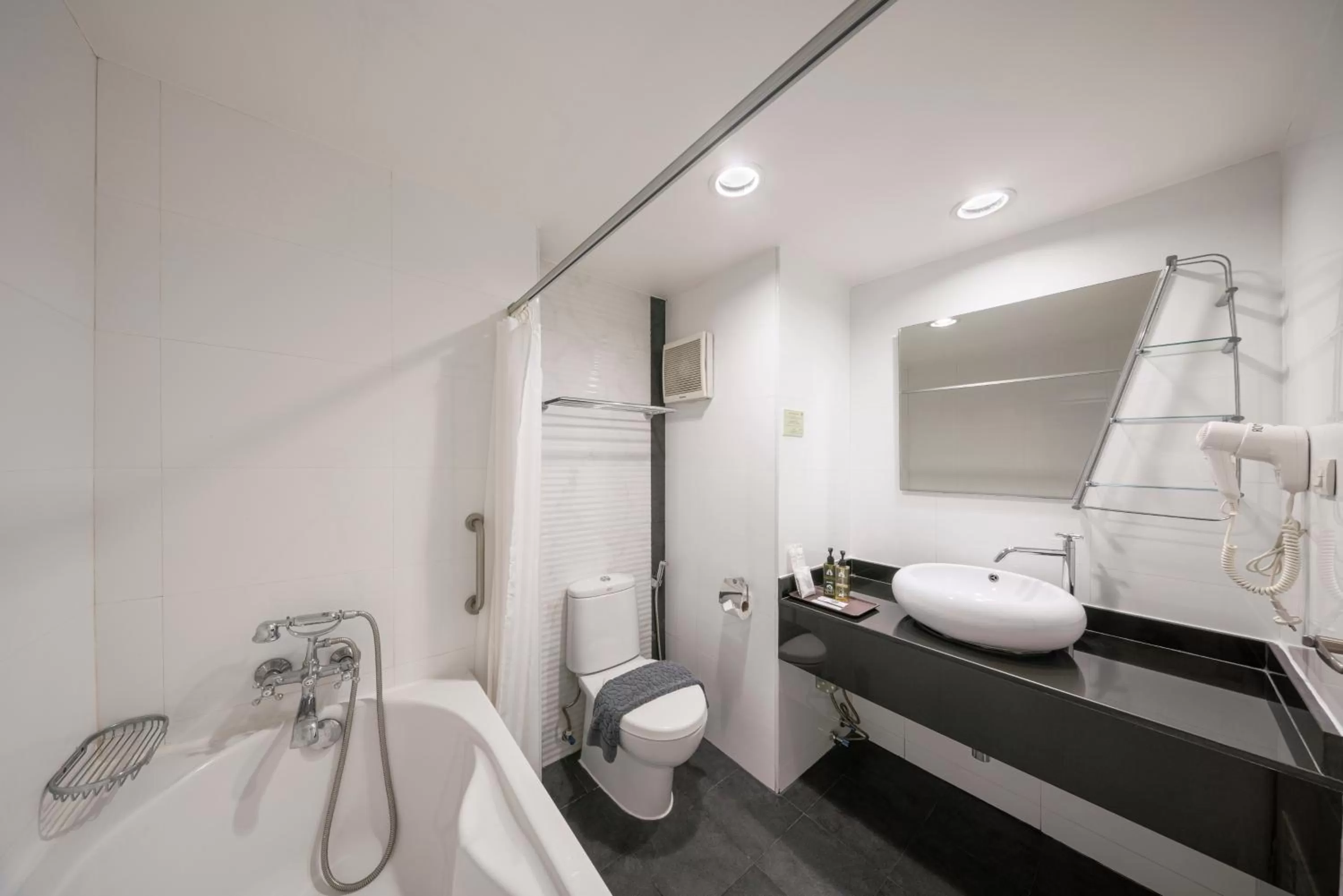 Bathroom in At 115 Hotel By Rompo