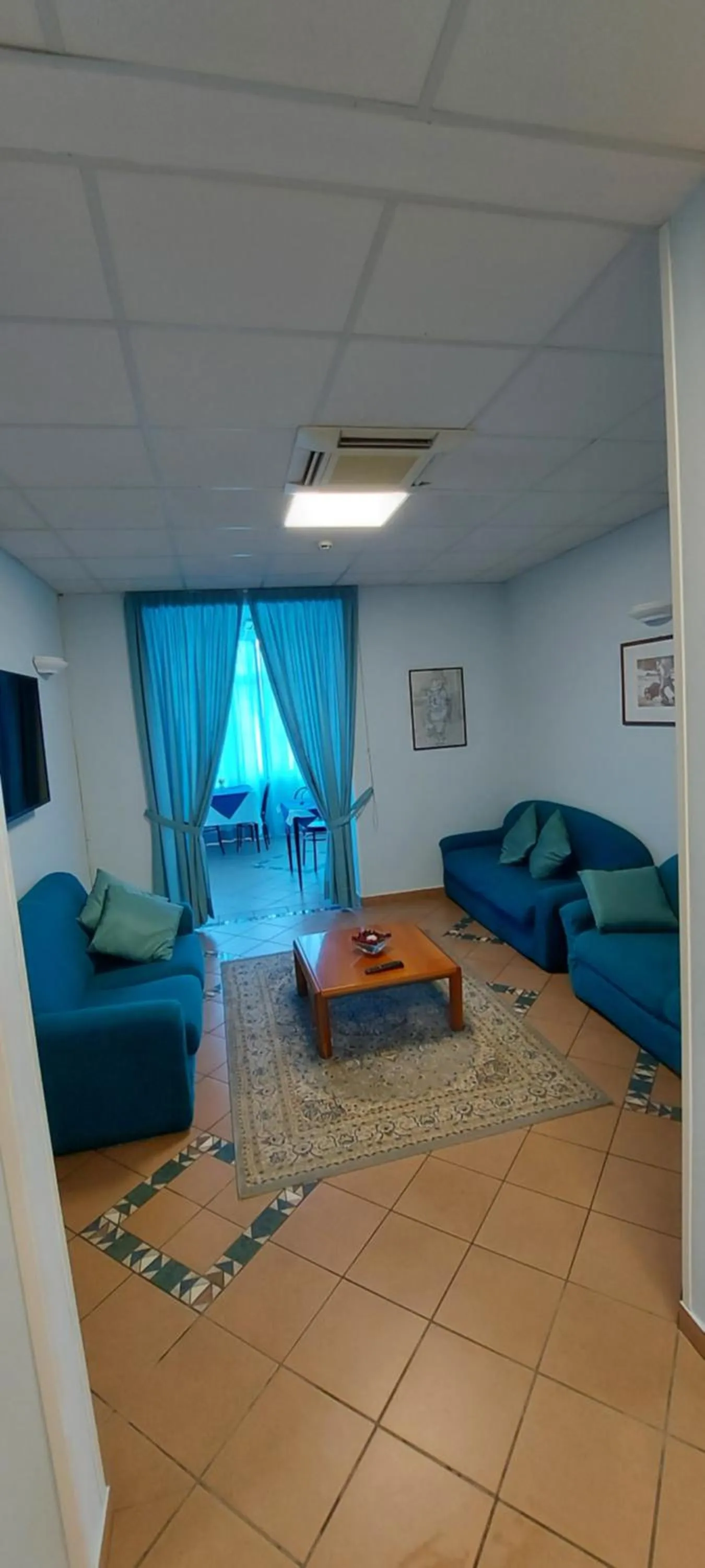 Communal lounge/ TV room in Hotel Savina