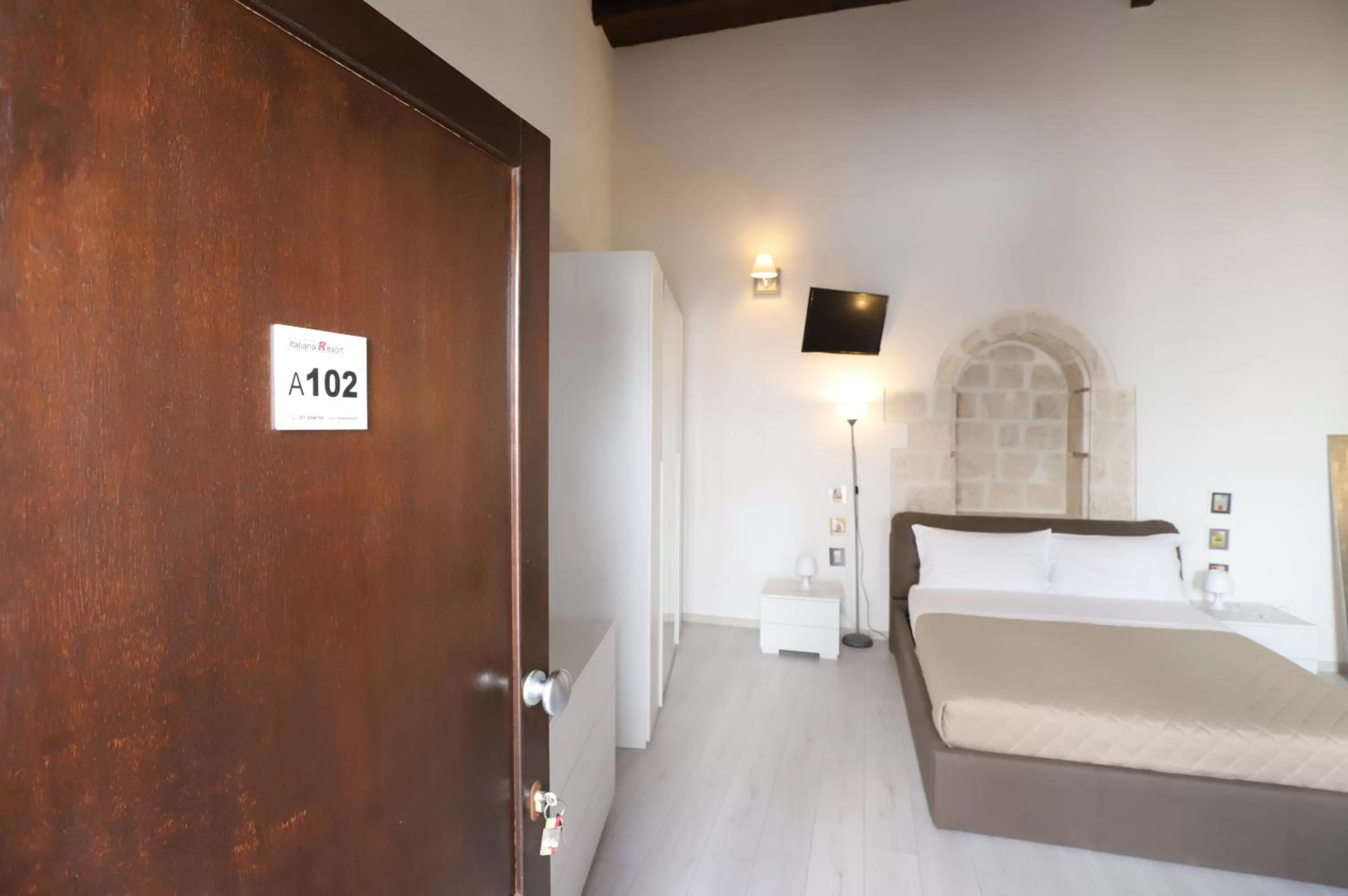 Bed in Italiana Resort Atrio