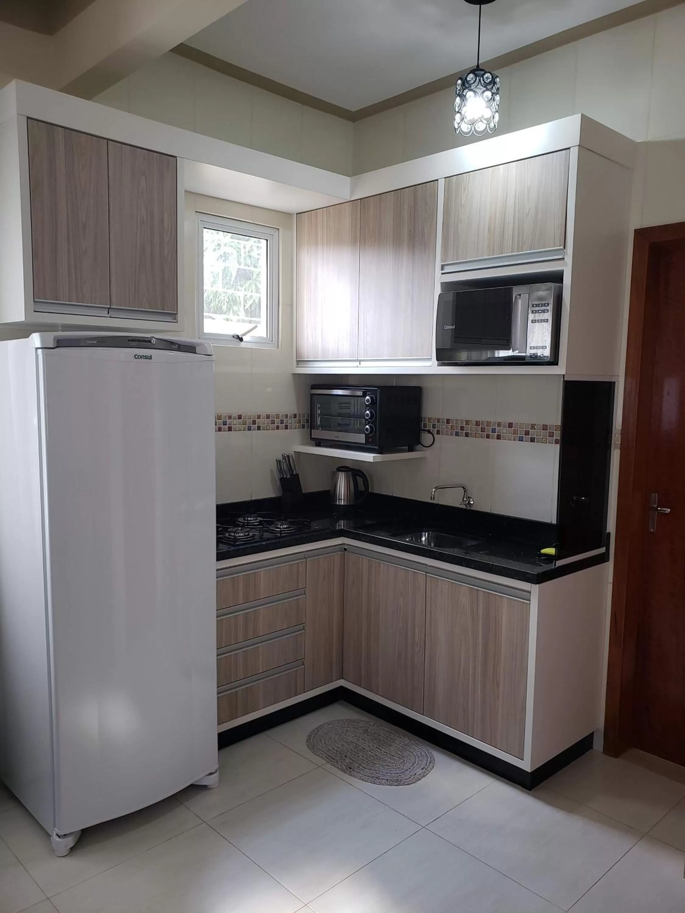 Kitchen or kitchenette in Felipe Family Houses - Casas de temporada
