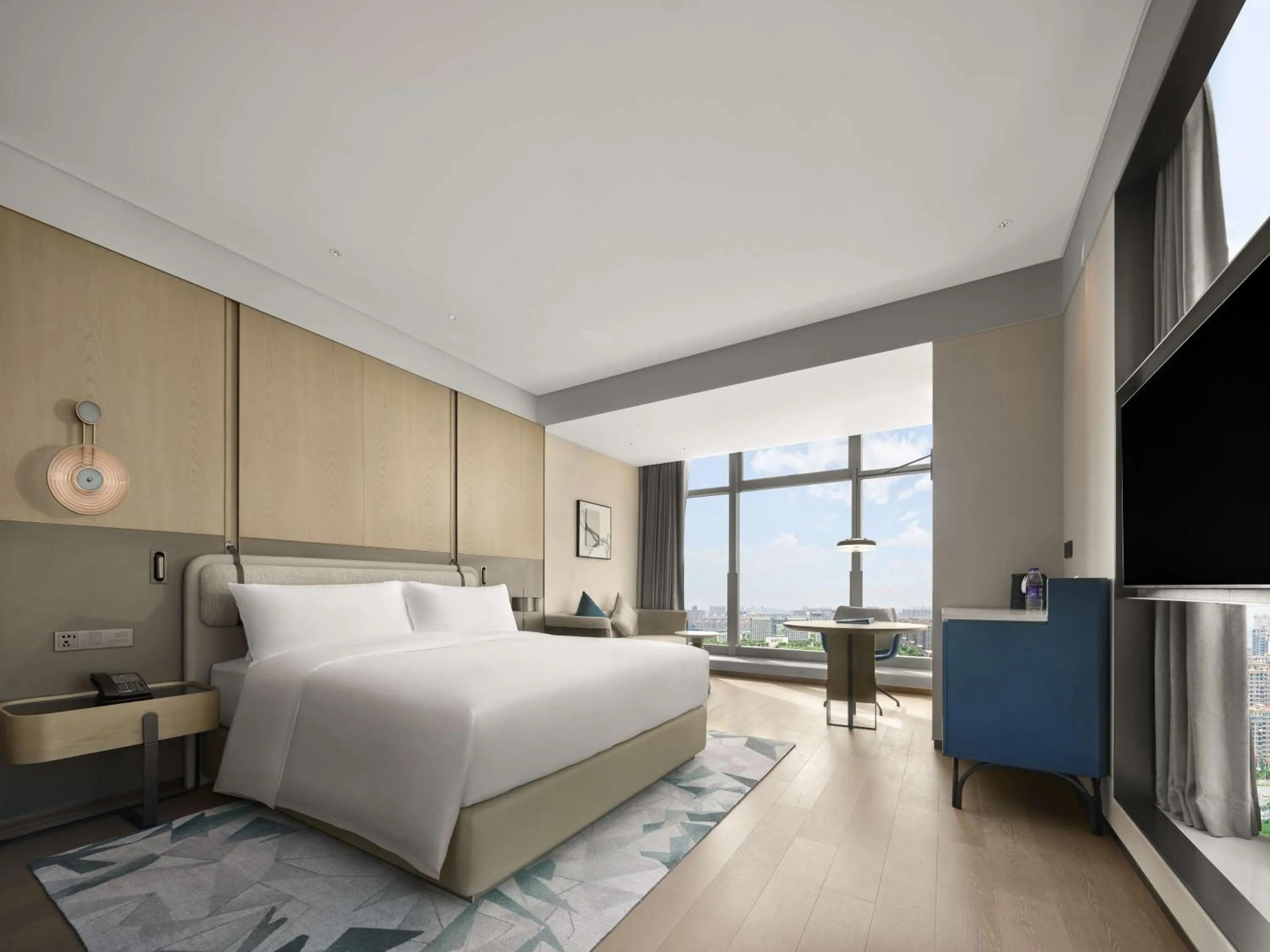 Living room, Bed in Doubletree By Hilton Rugao