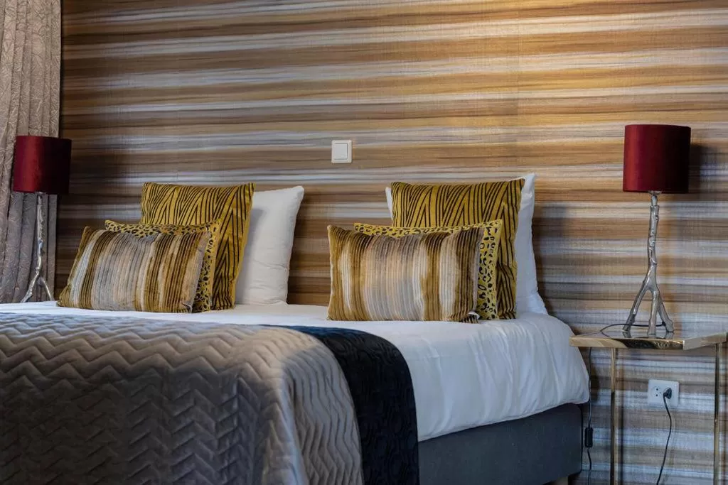 Bed in Boutique Hotel Slenaker Vallei - Buitengewoongenieten