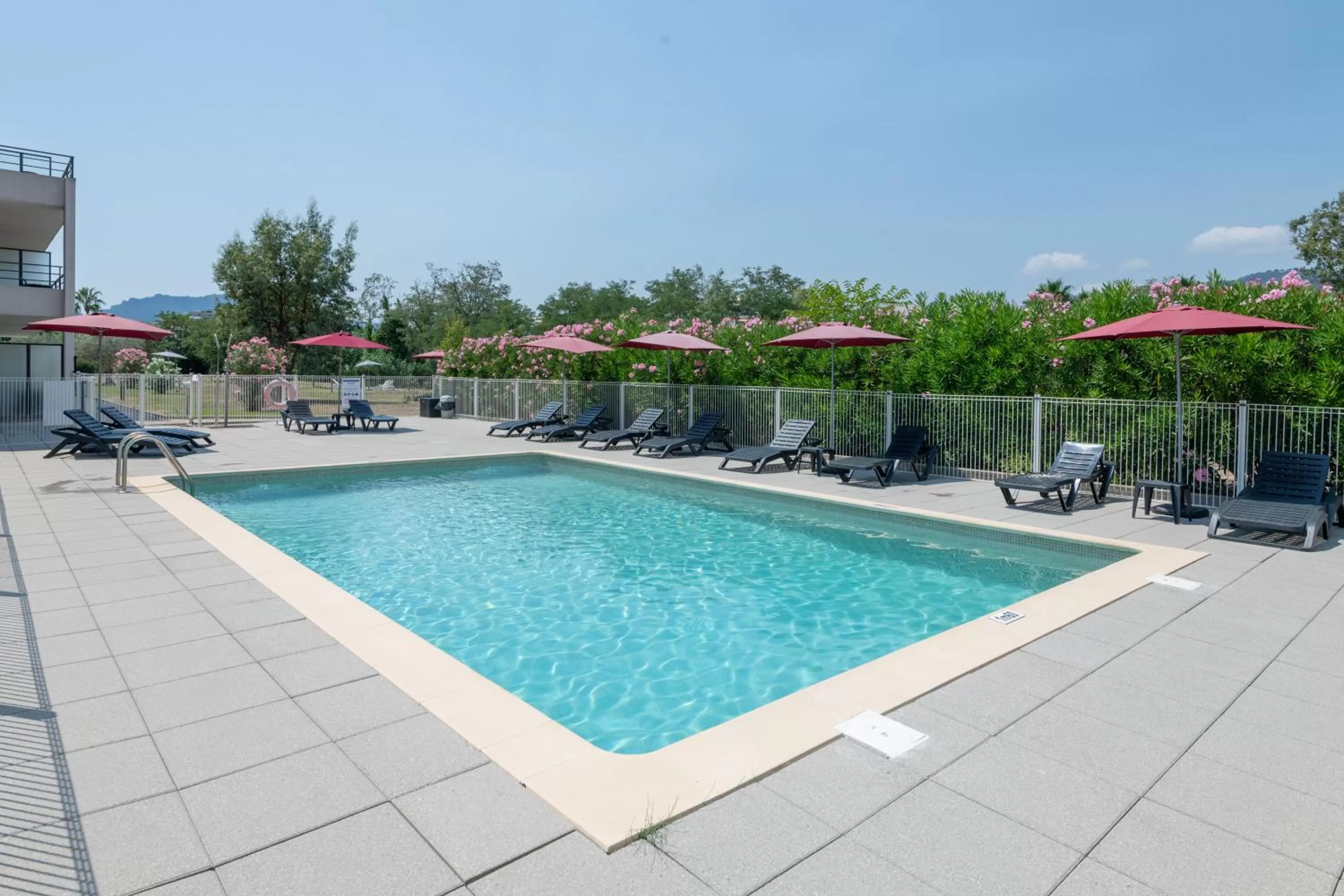 Swimming pool in Comfort Aparthotel Cannes Mandelieu
