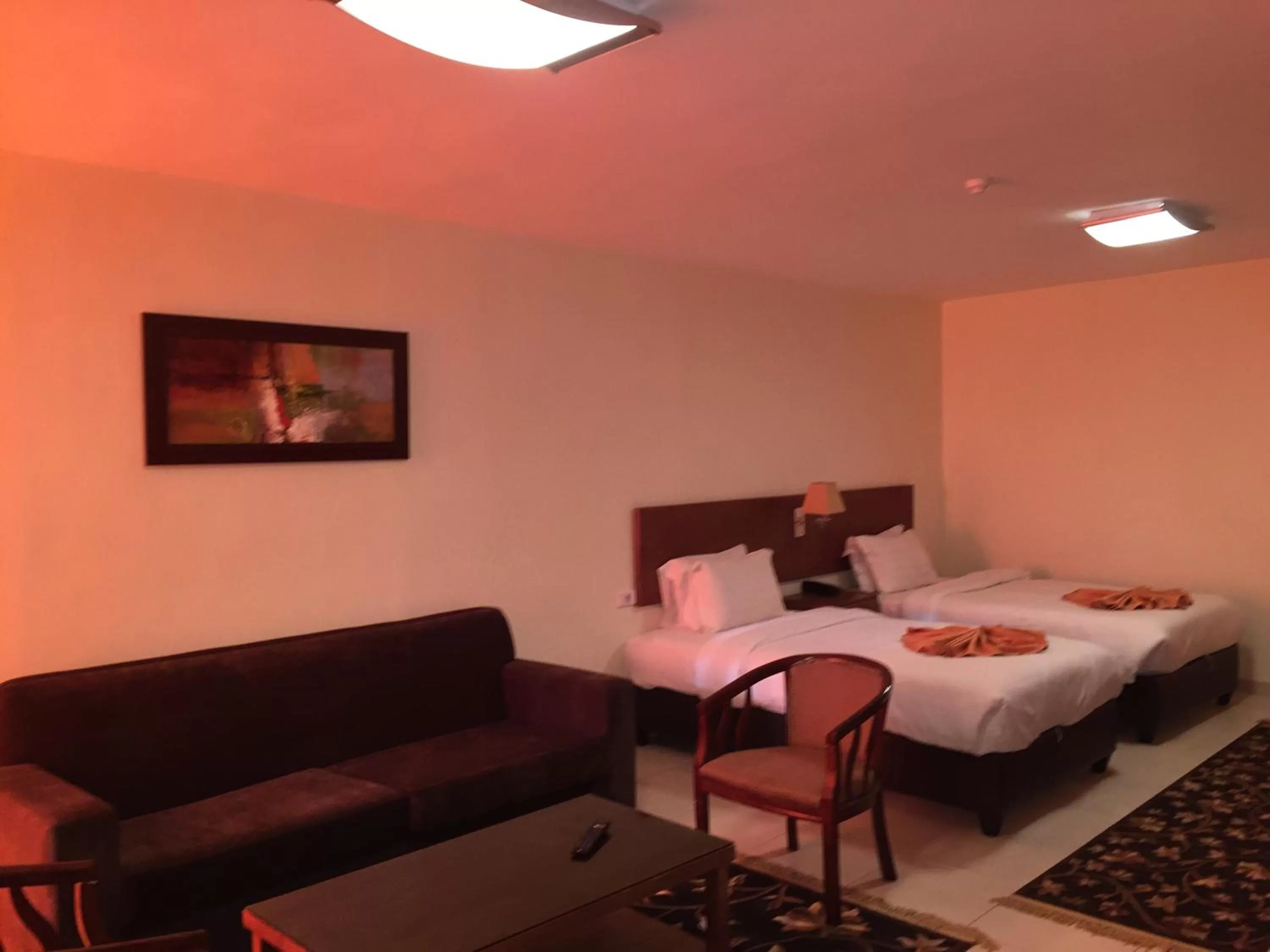 Bed in Zaina Plaza Hotel