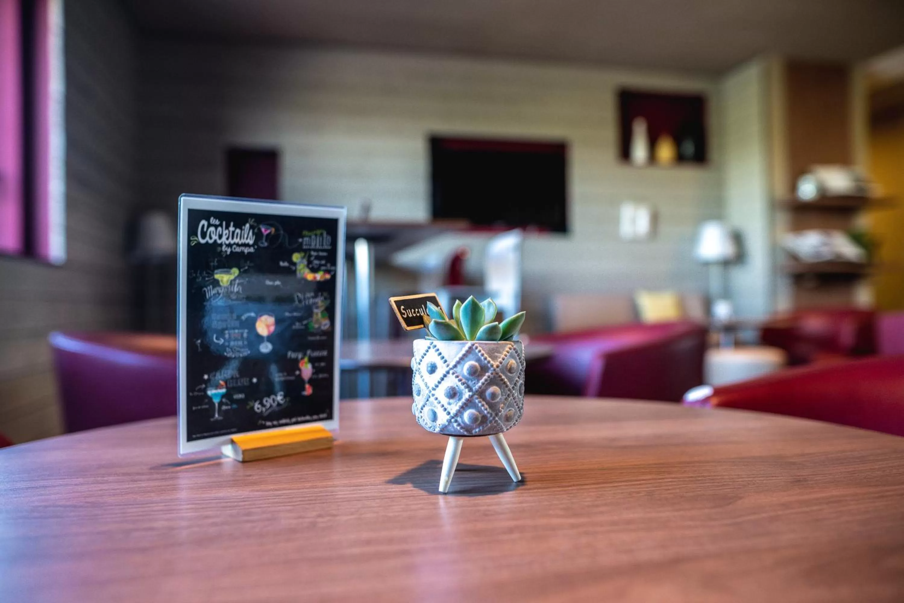 Communal lounge/ TV room in Campanile Carcassonne Est - La Cité