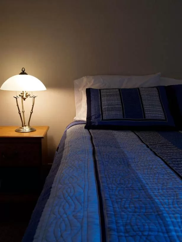 Bed in Beach Cottage Inn