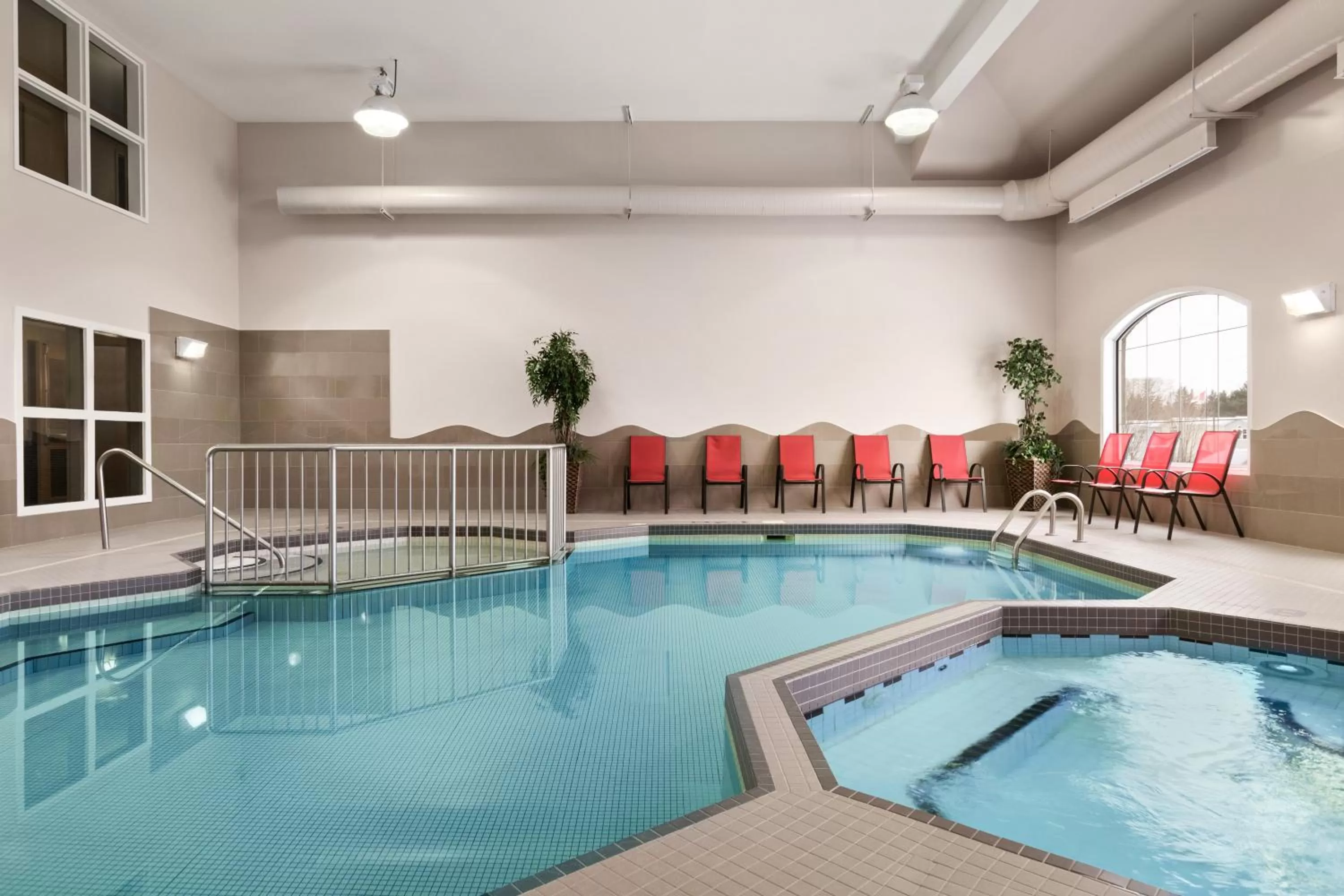 Swimming pool in Days Inn & Suites by Wyndham Brandon