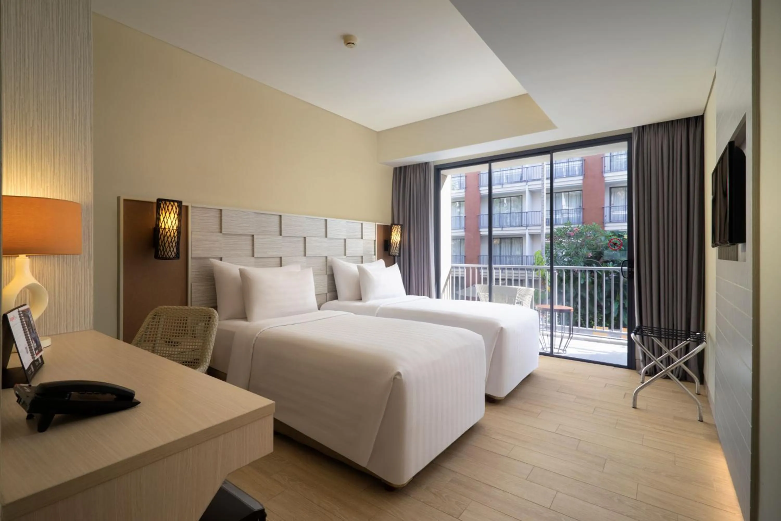 Bed in Swiss-Belhotel Tuban Bali