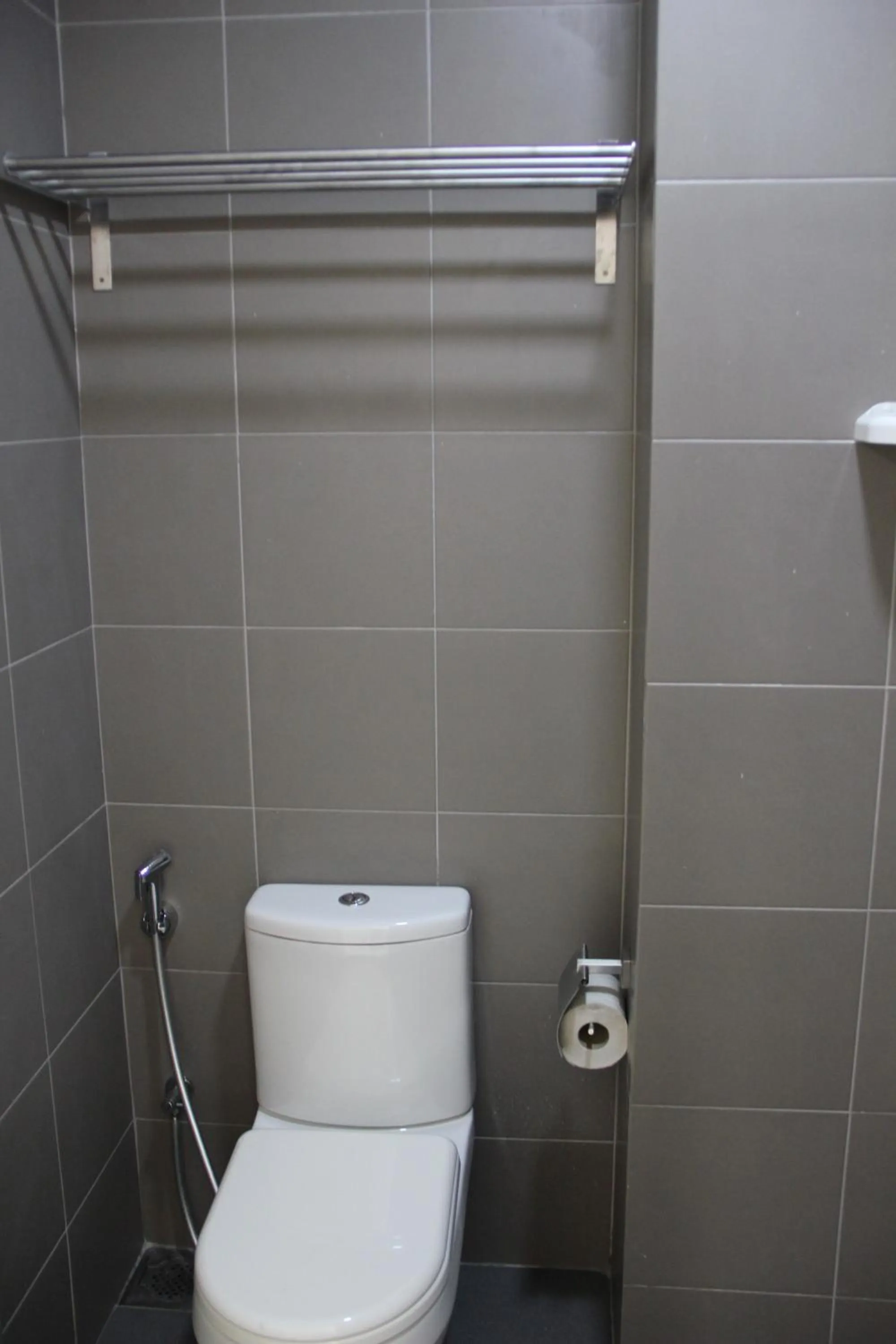 Toilet in Summer Suites Residences by Subhome