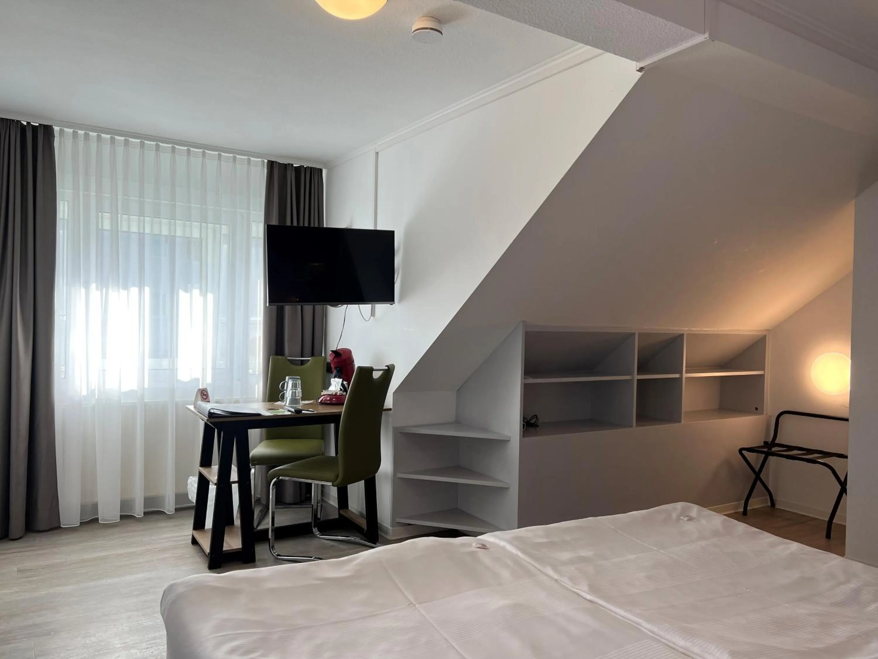 Photo of the whole room, Bed in Hotel Bitzer Backnang