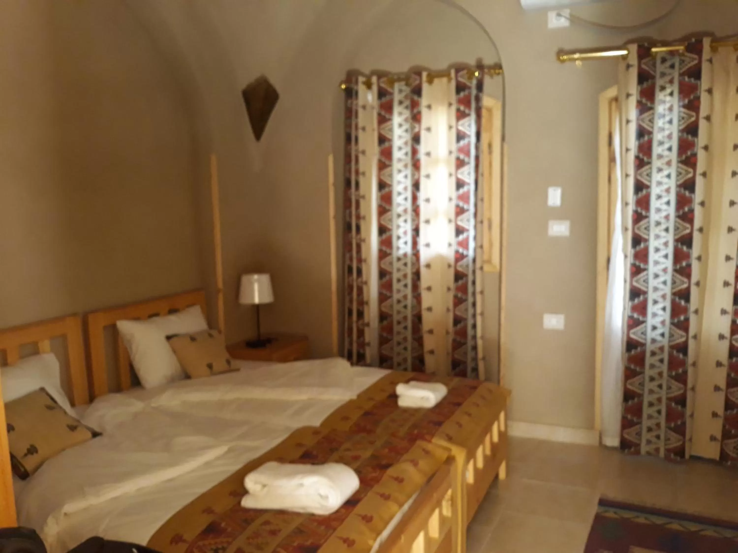 Bed in Embrace Hotel