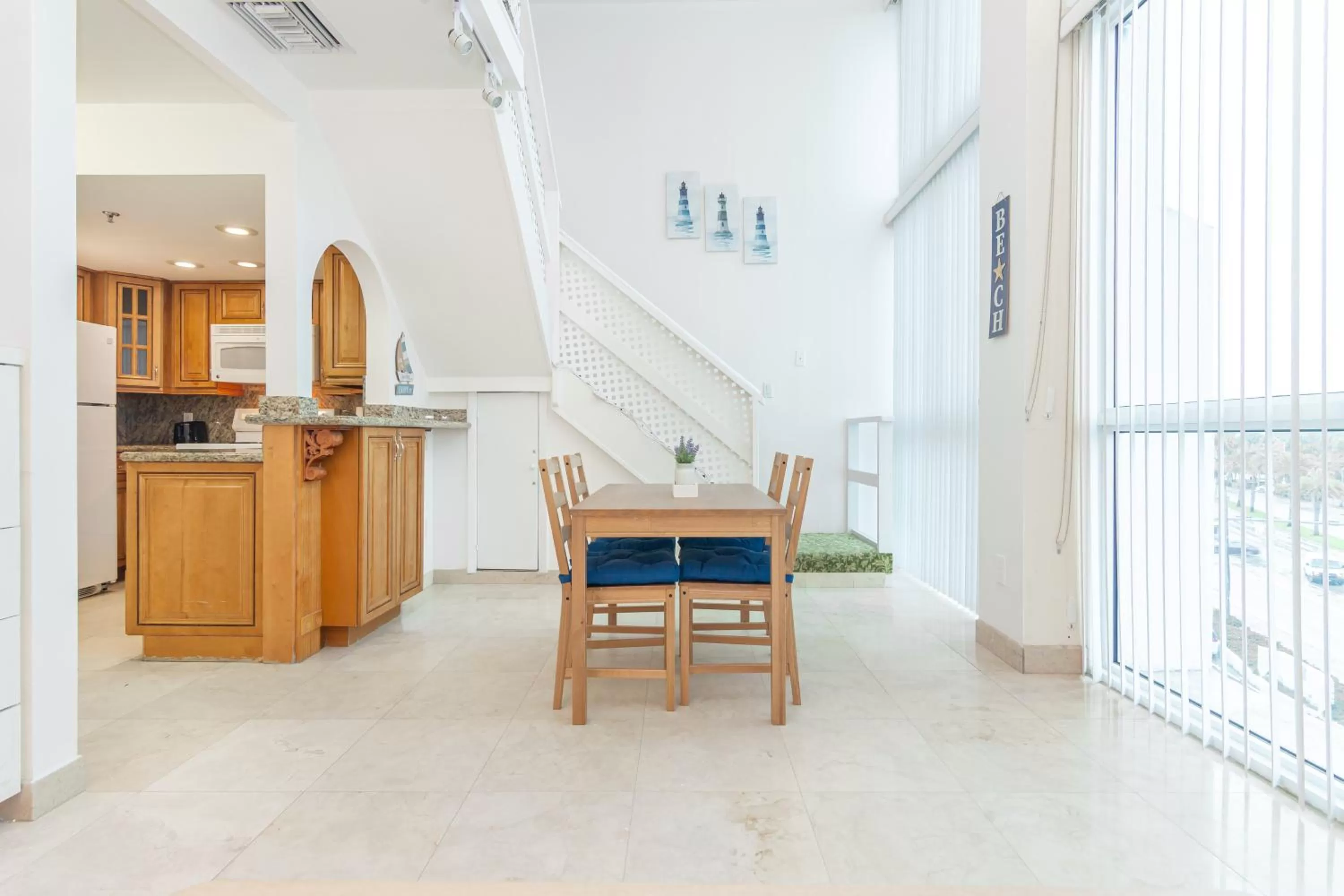 Kitchen or kitchenette, Dining Area in Girasole Rentals