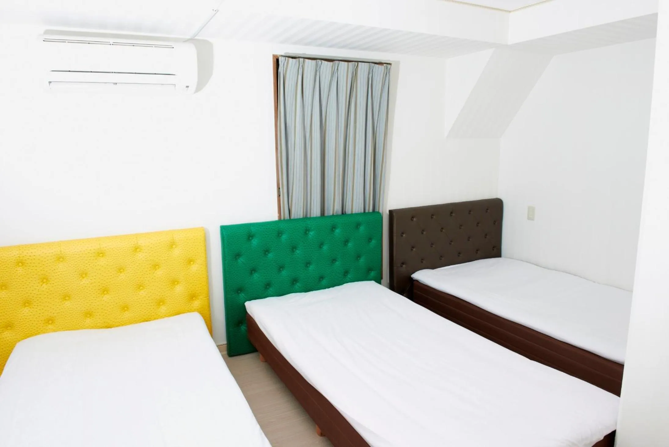 Bed in Hotel Empire in Shinjuku