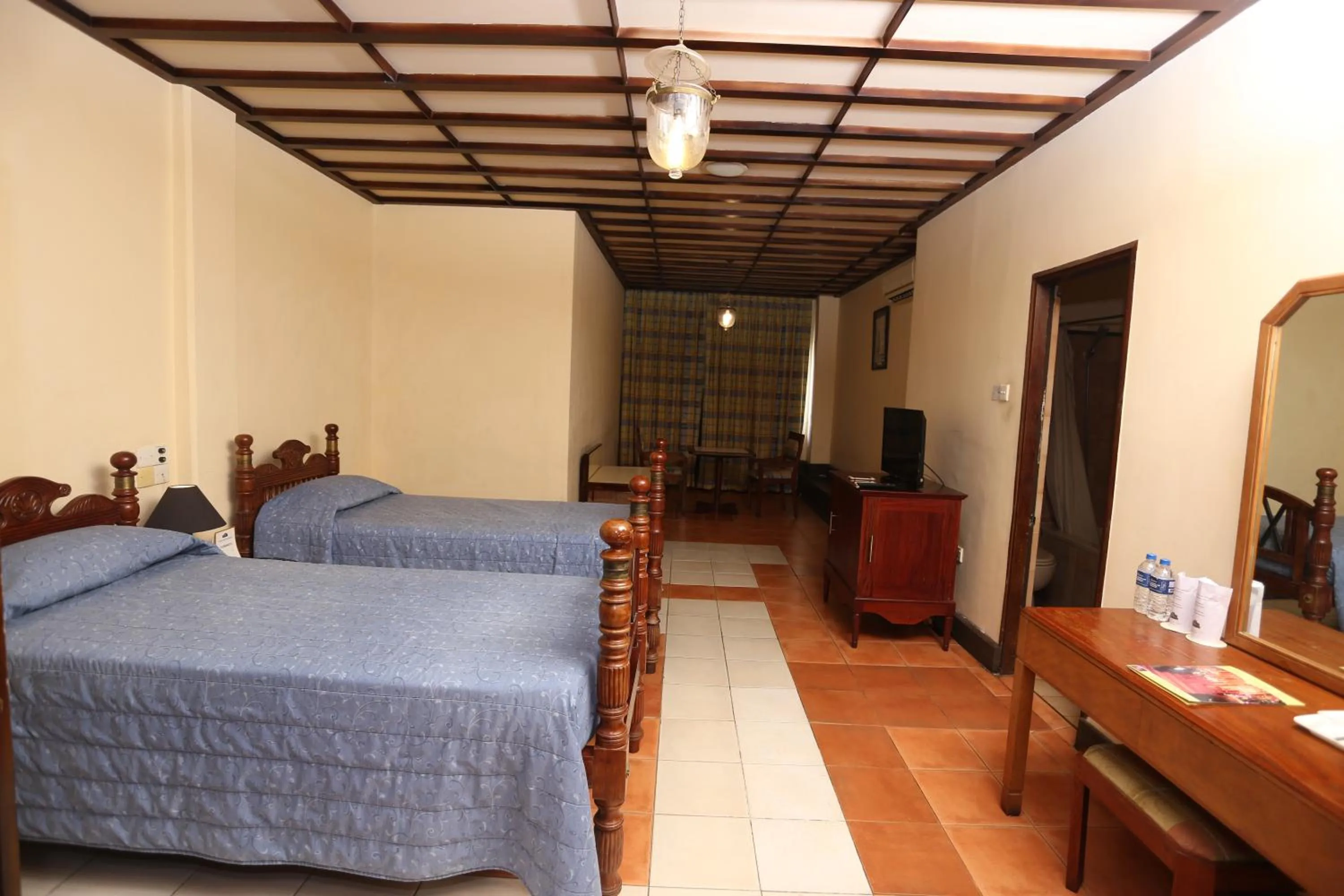 Bed in Grand Oriental Hotel