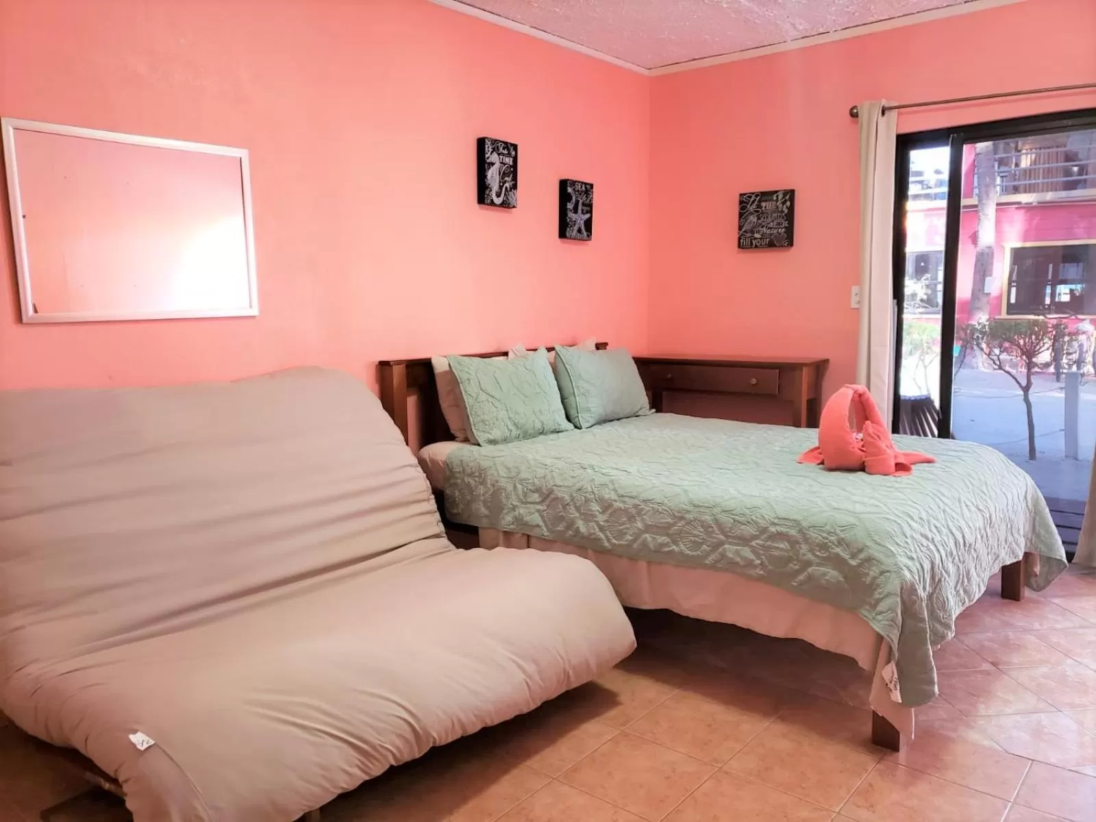 Bed in Beach Side Condos Caye Caulker by CCVH