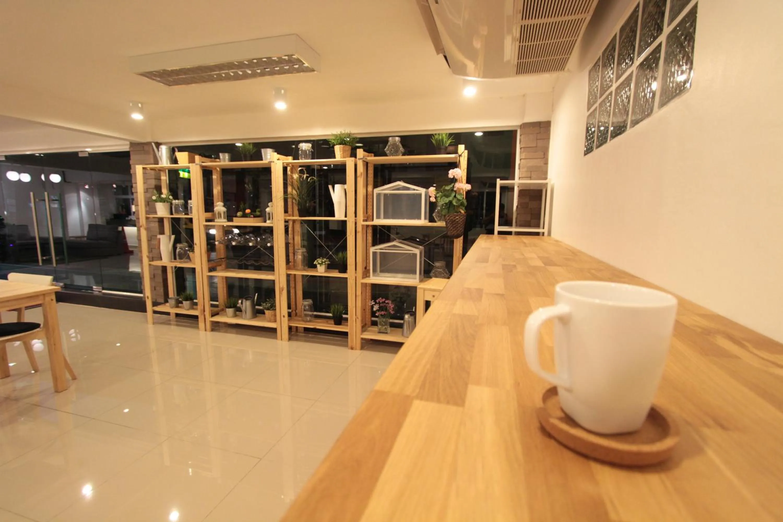 Communal lounge/ TV room in Napaville Huai Khwang