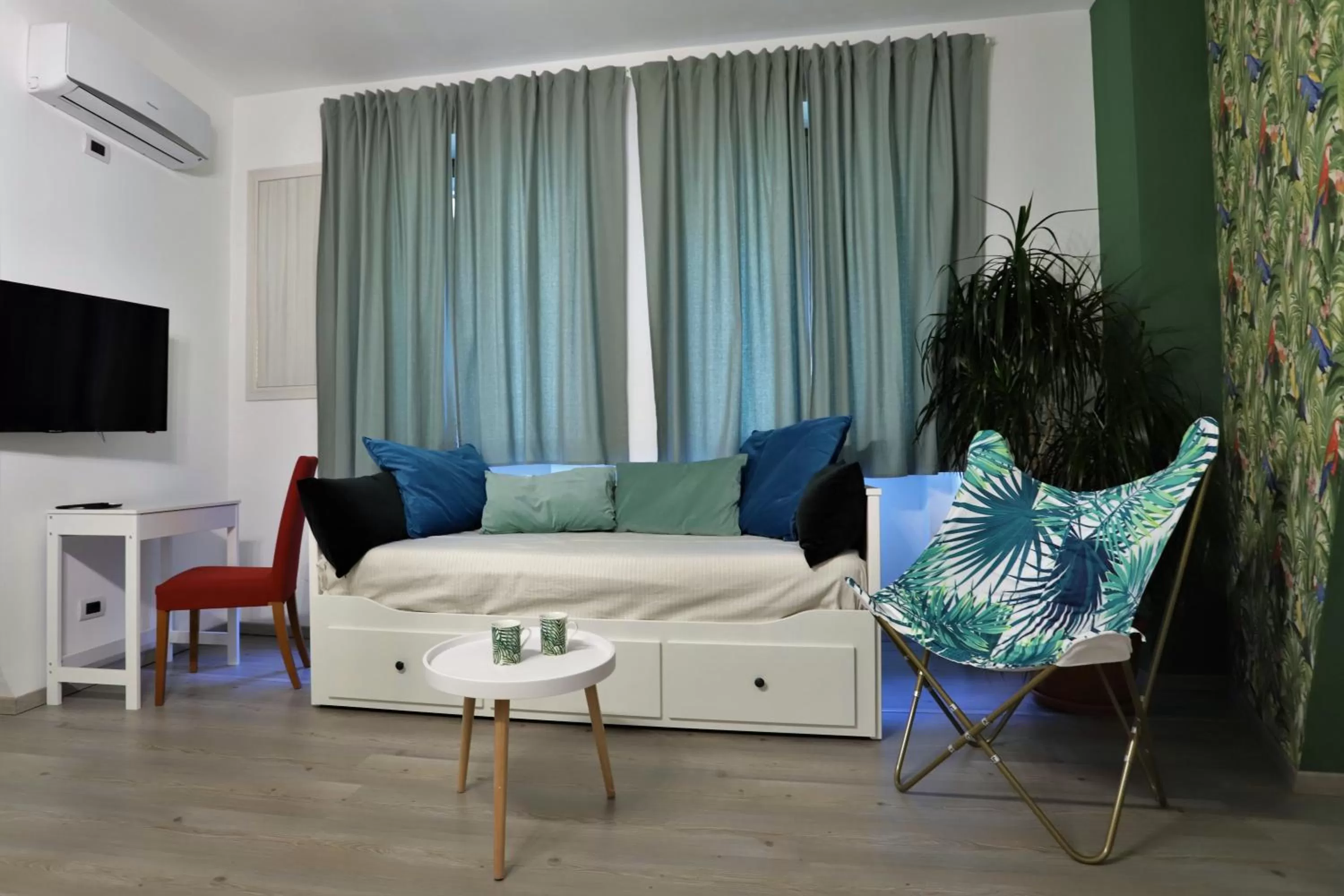 Bed, Seating Area in Napoli Vesuvio Apartments by Dimorra