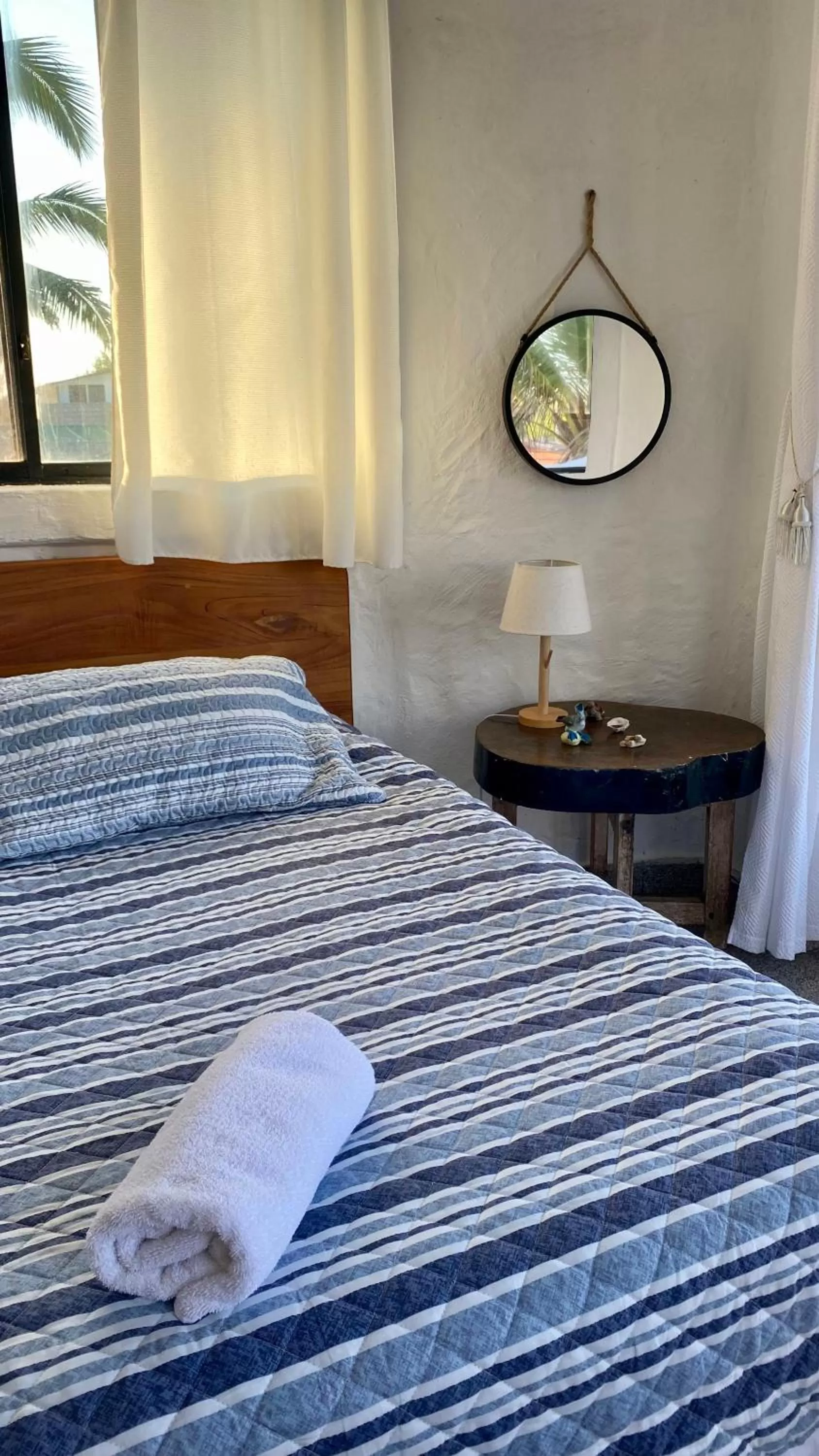 Bed in Hostal Galapagos by Bar de Beto