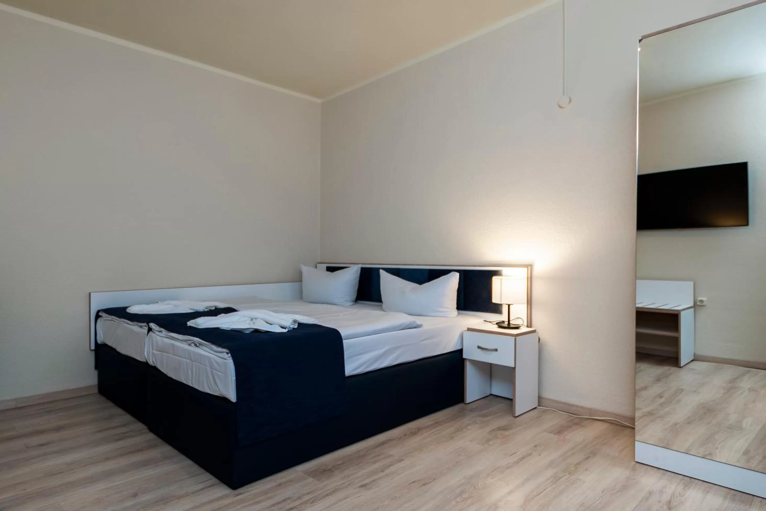 Bed in Aparthotel Stralsund Studios und Apartments