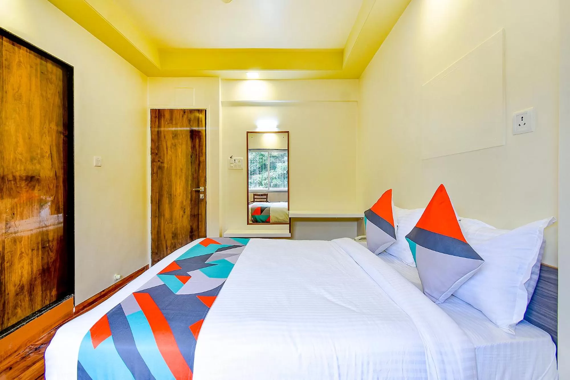 Bed in FabHotel Nandanvan