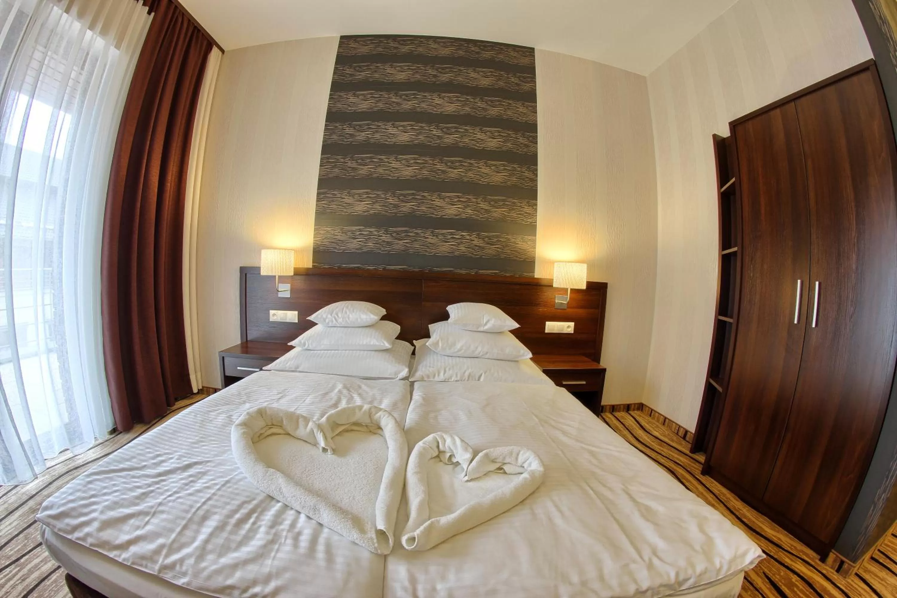 Bed in Hotel Arkas