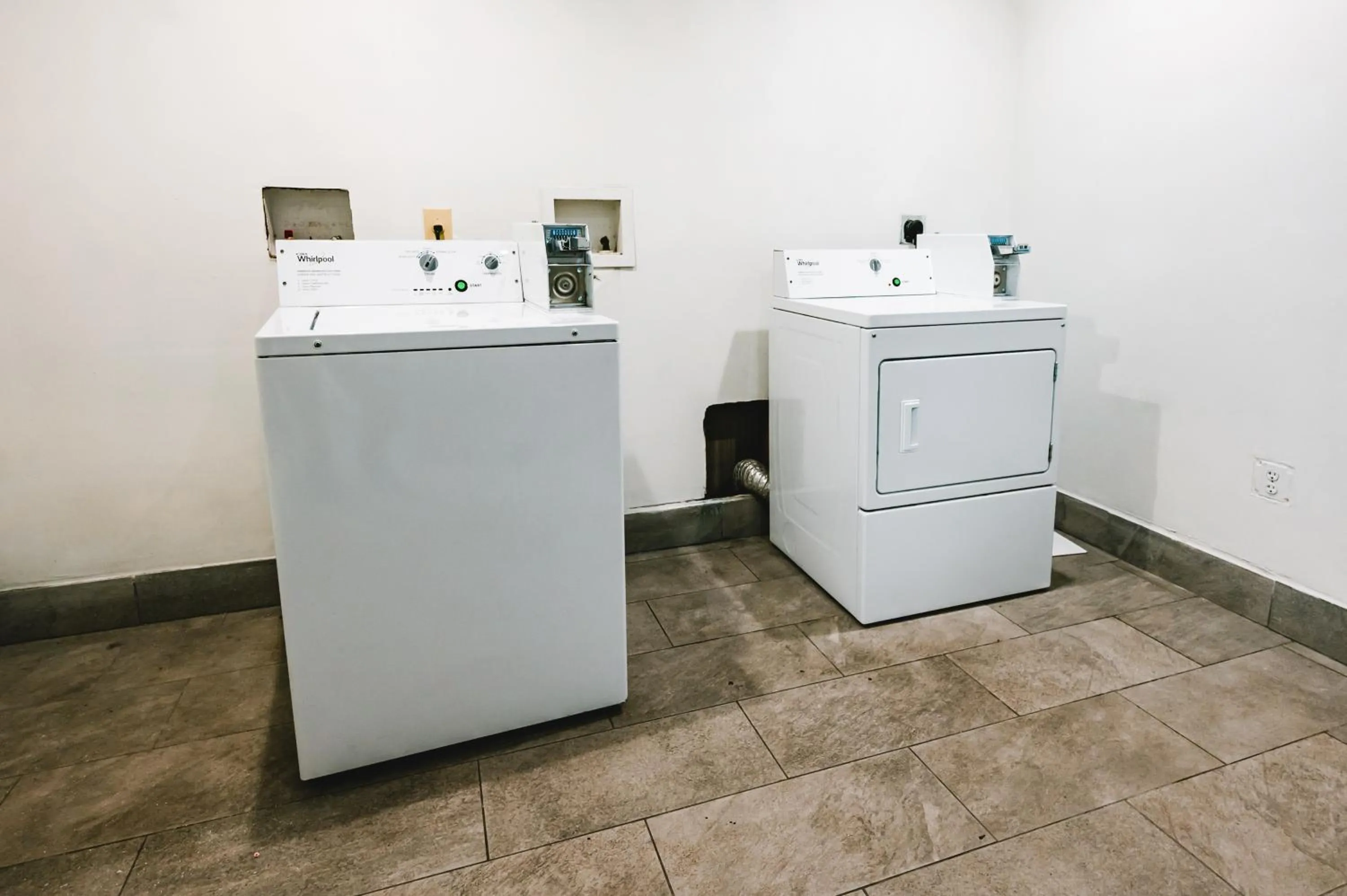 laundry in HomeTowne Studios by Red Roof San Antonio - SeaWorld Northwest