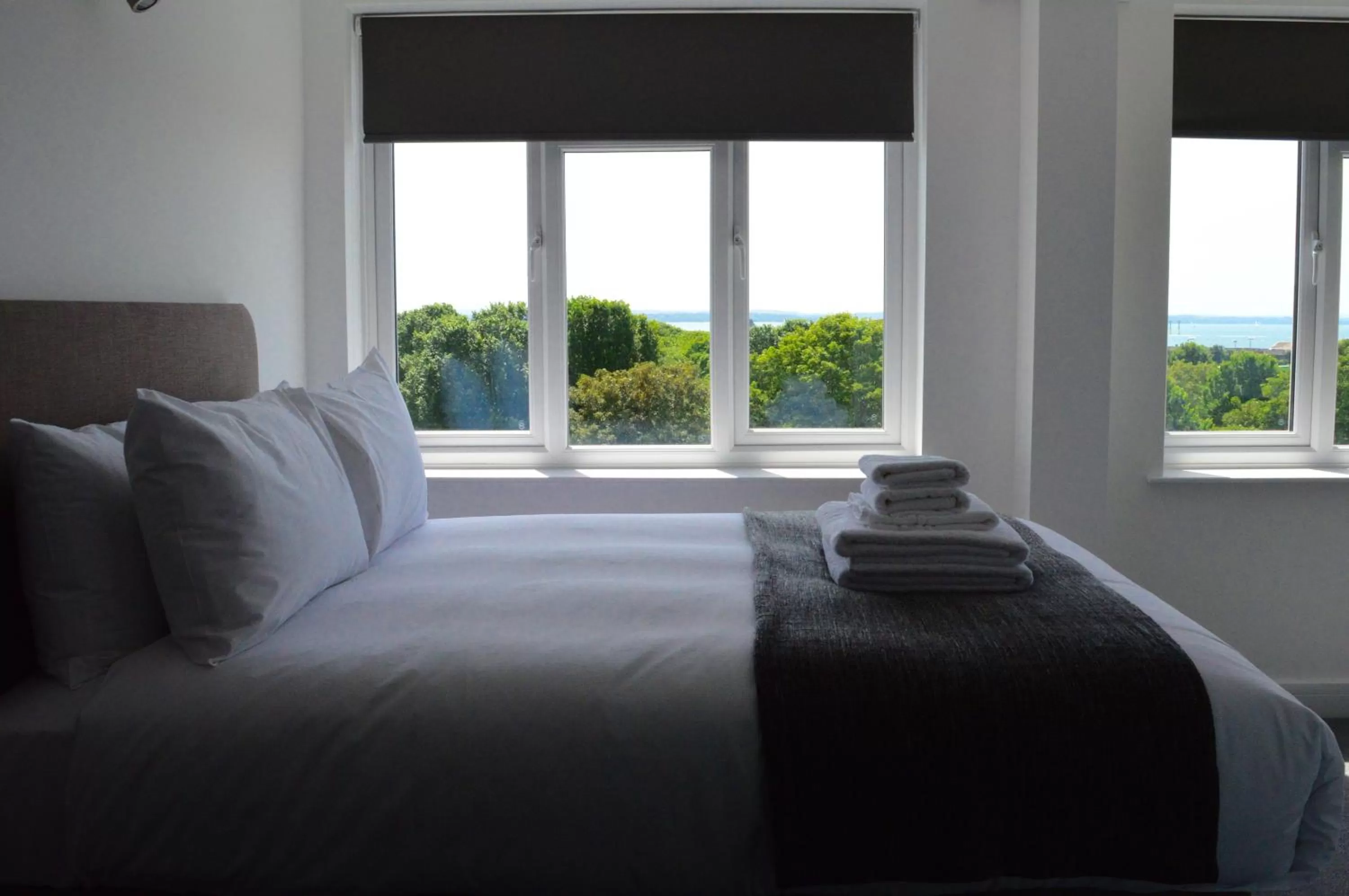 Bed in Q8 Boutique Hotel