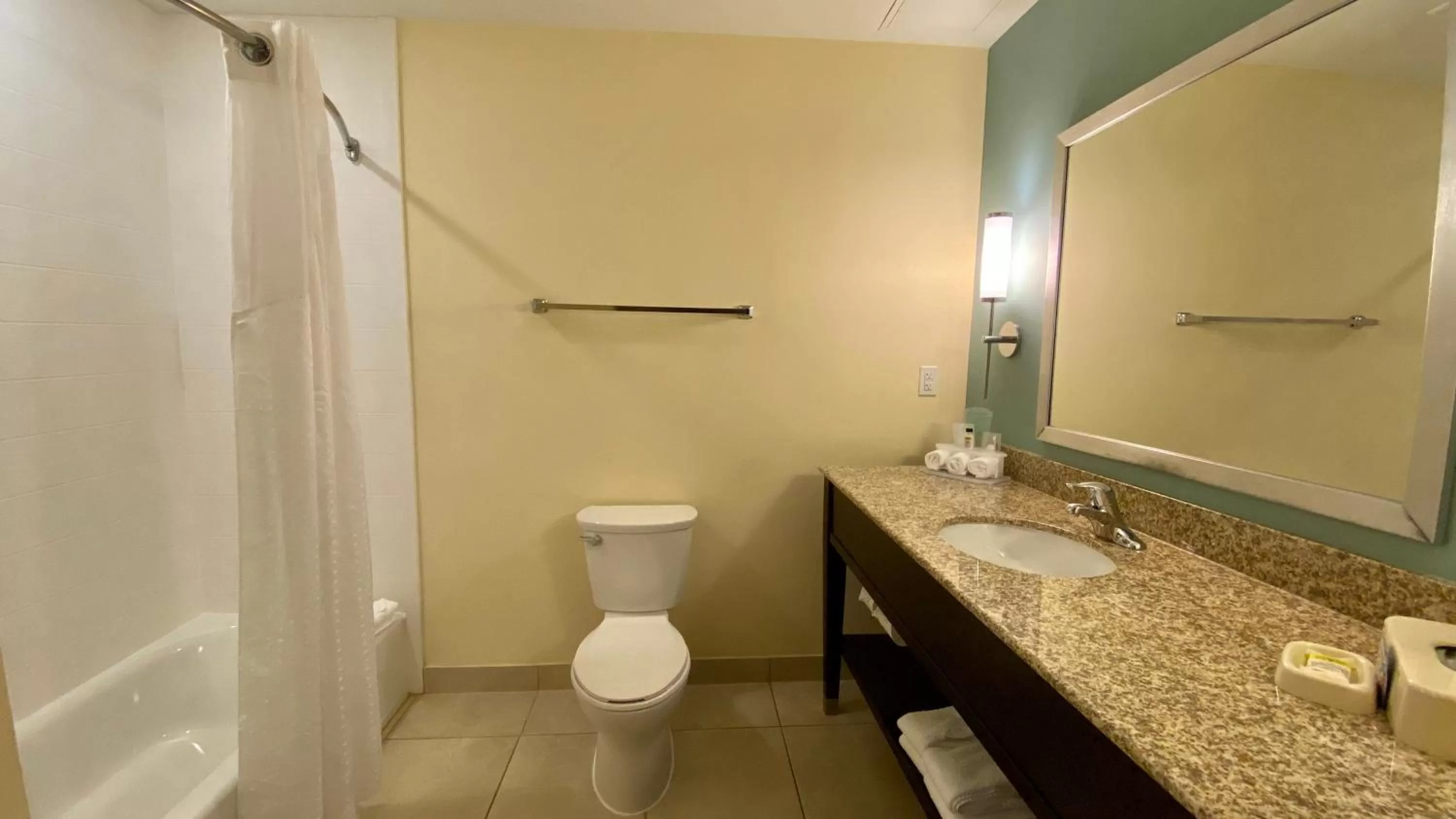 Bathroom in Holiday Inn Express Hotel & Suites Orlando East-UCF Area by IHG