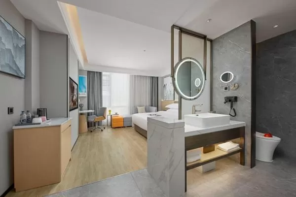 Photo of the whole room, Bed in Fengyue Light Shang Hotel Guangzhou Baiyun Airport Store