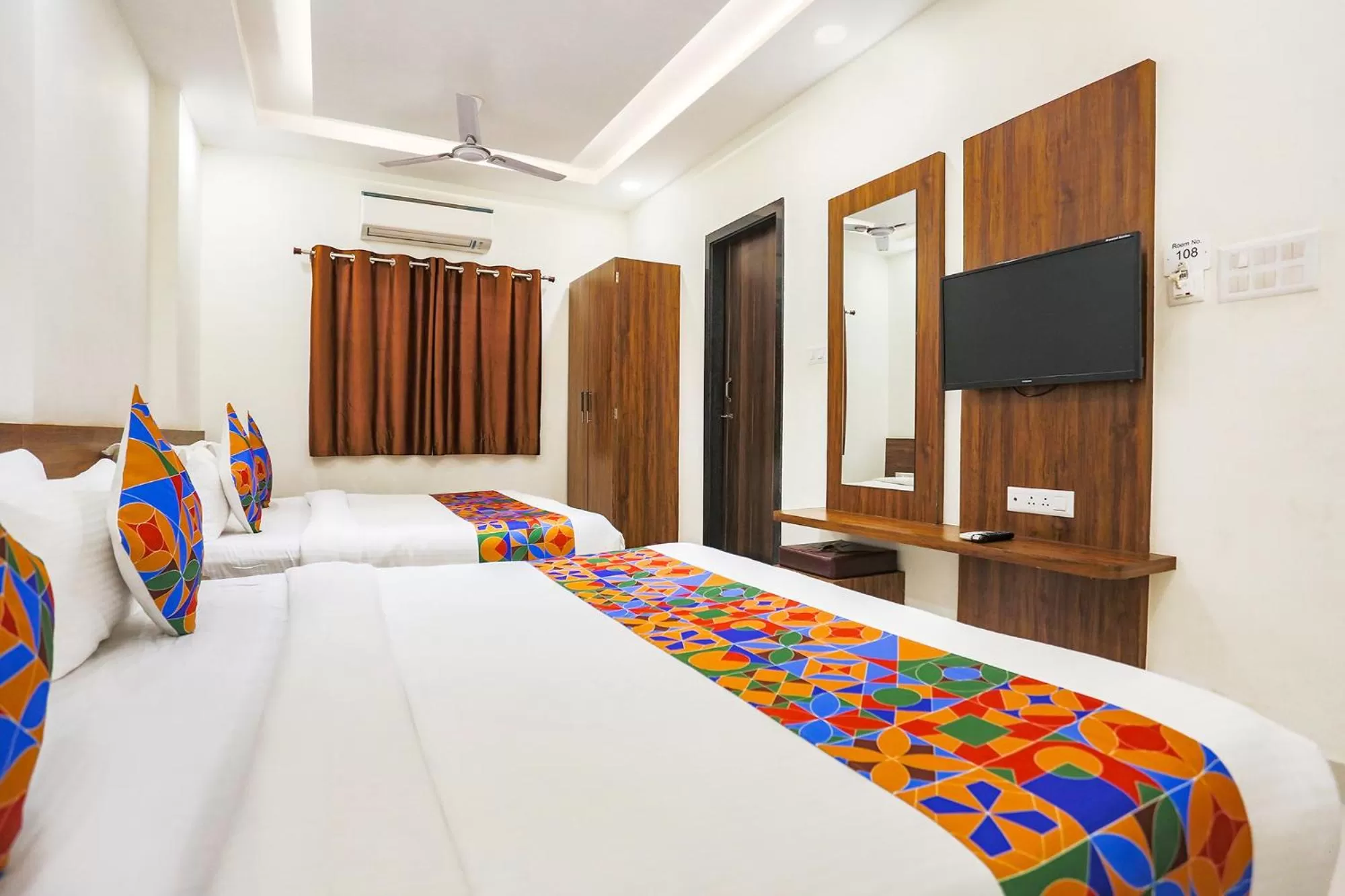 Bed in FabHotel Balaji Paradise