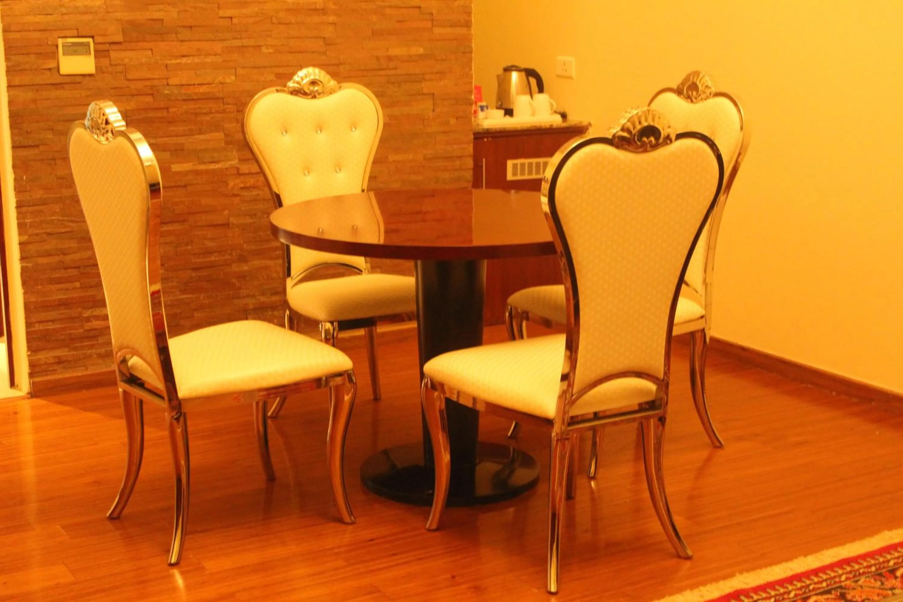 Living room in Ramada by Wyndham Jaipur Jaisinghpura