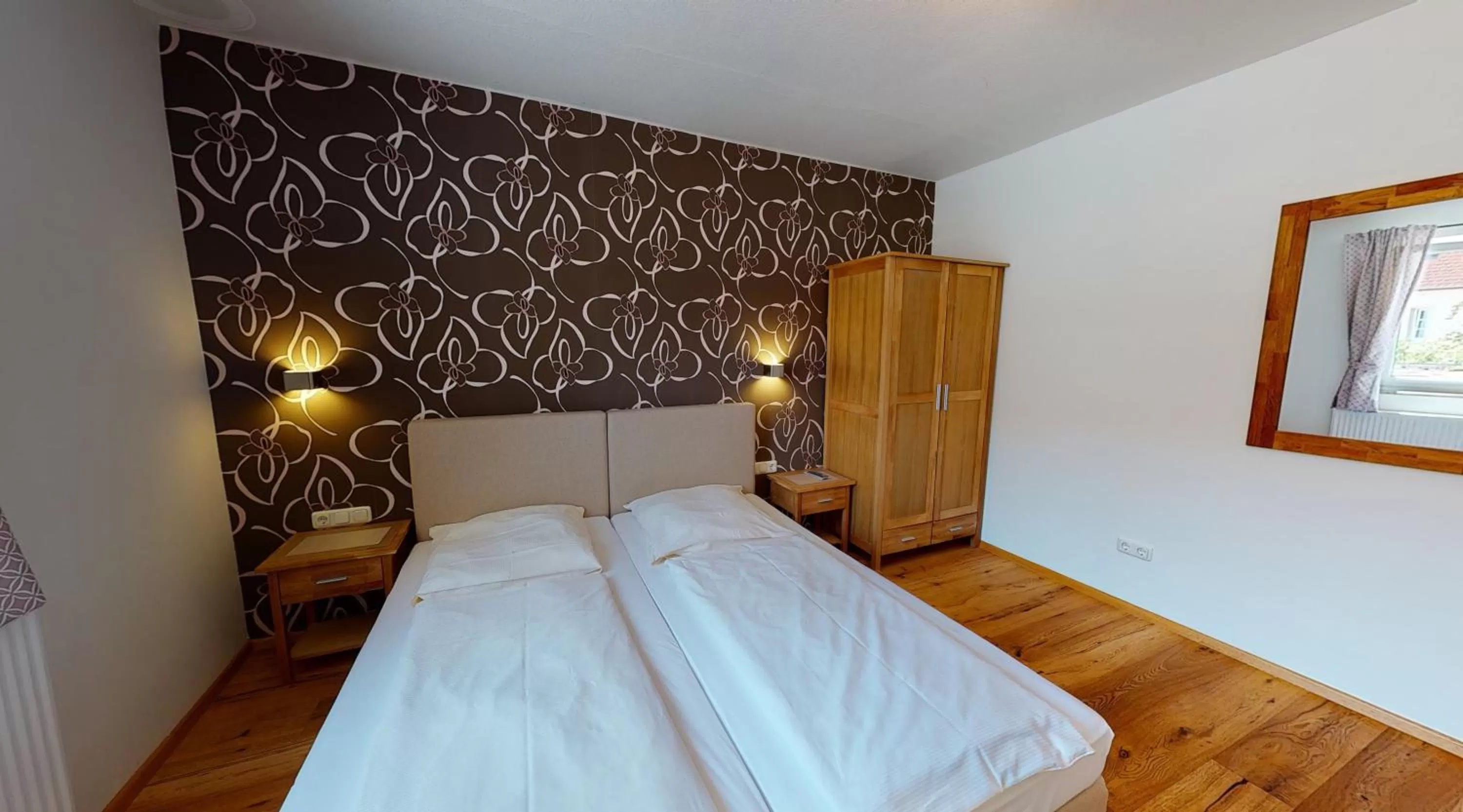 Bed in Hotel Rothenburger Hof